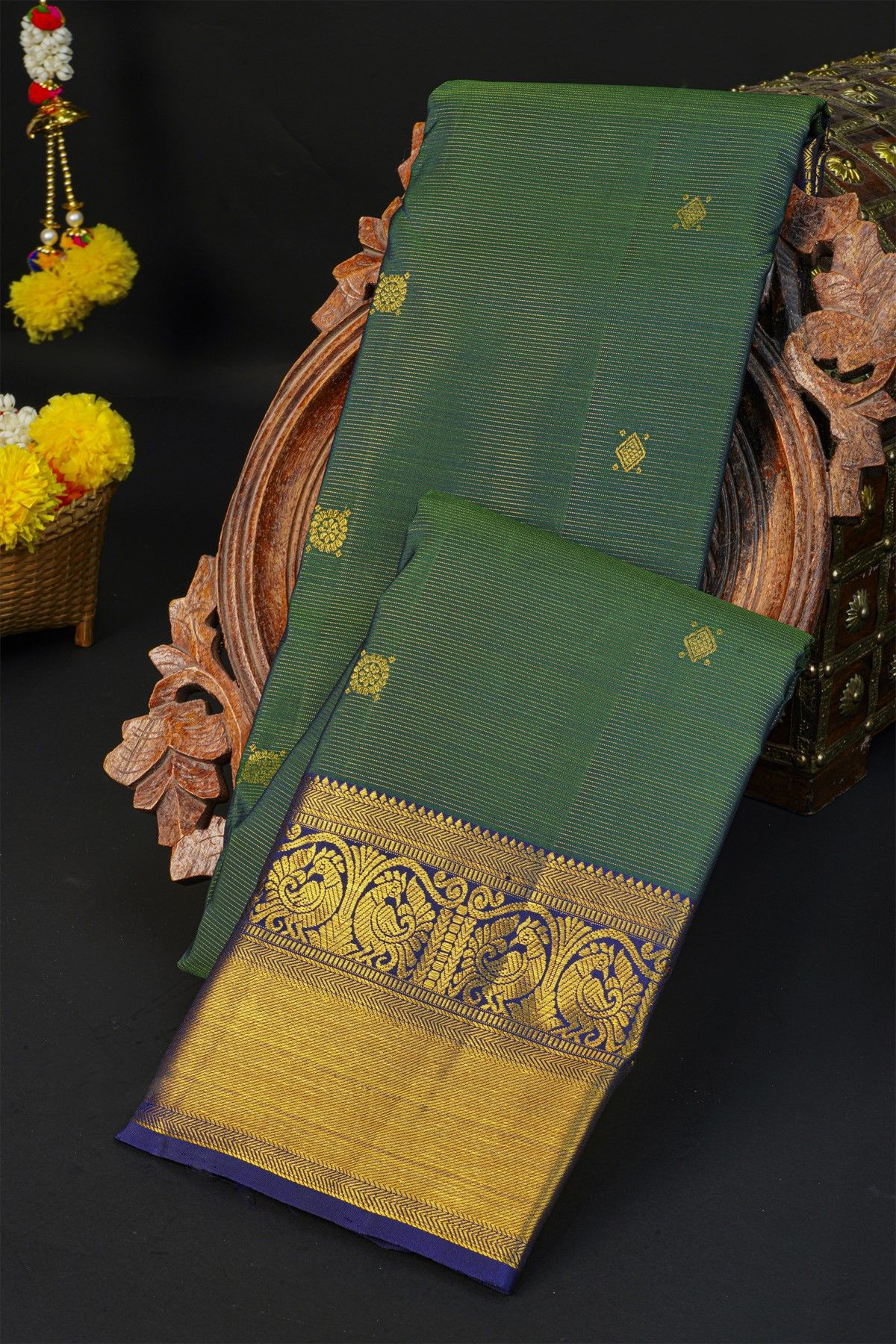 Kancheepuram Silk Peacock Green Saree With Zari Lines And Floral Buttis Body