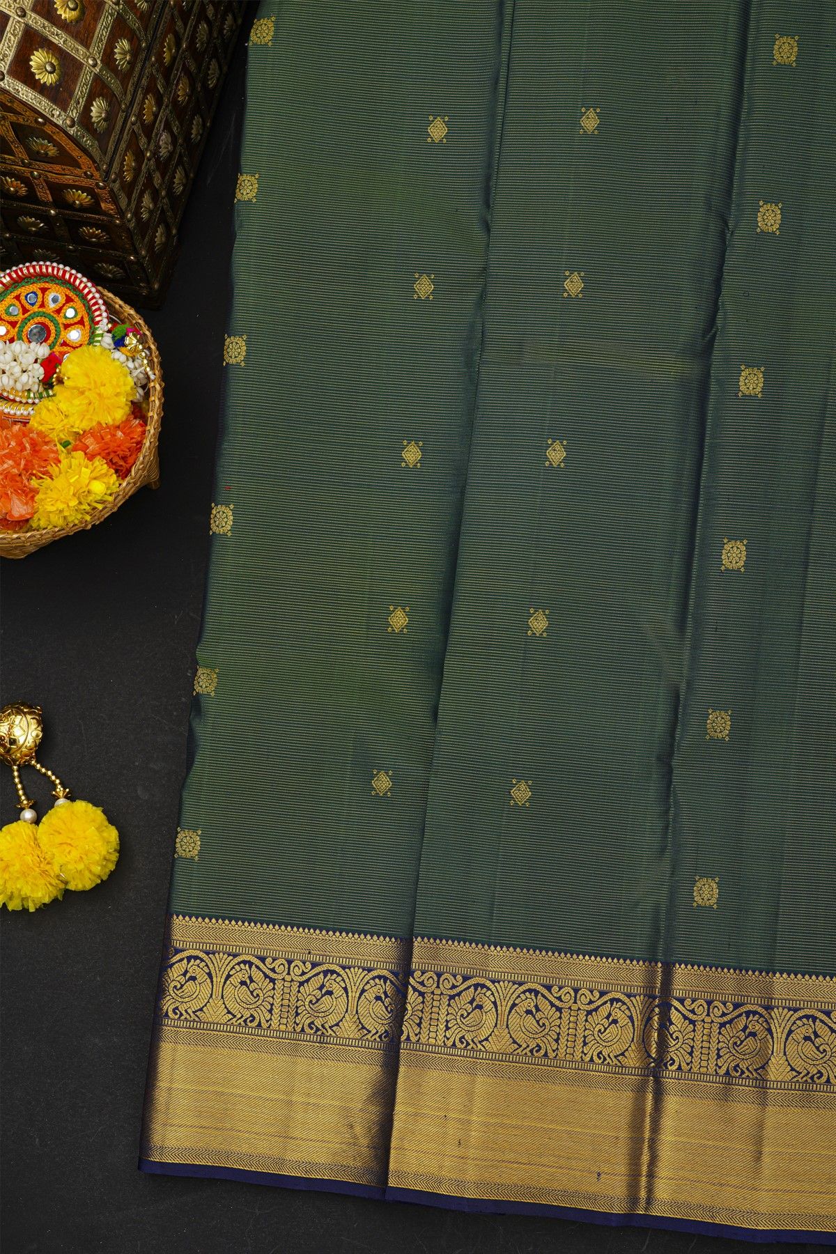 Kancheepuram Silk Peacock Green Saree With Zari Lines And Floral Buttis Body