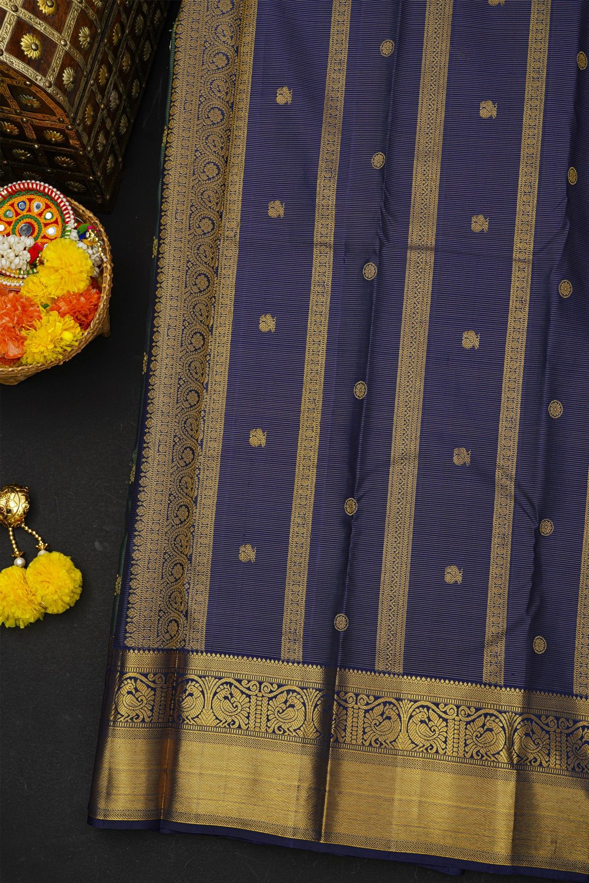 Kancheepuram Silk Peacock Green Saree With Zari Lines And Floral Buttis Body