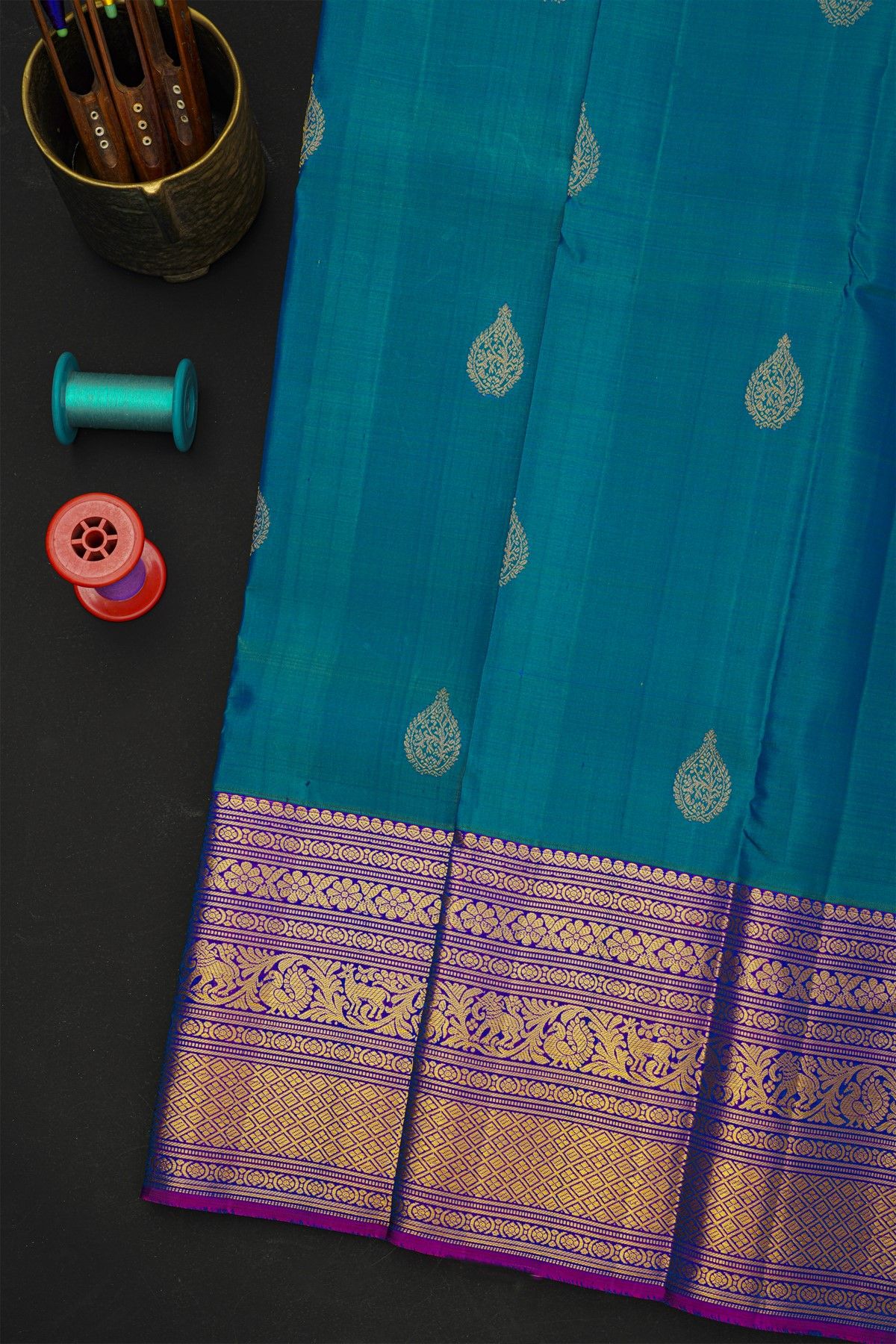 Kancheepuram Silk Blue Saree With Florals And Leaves In Zari Body
