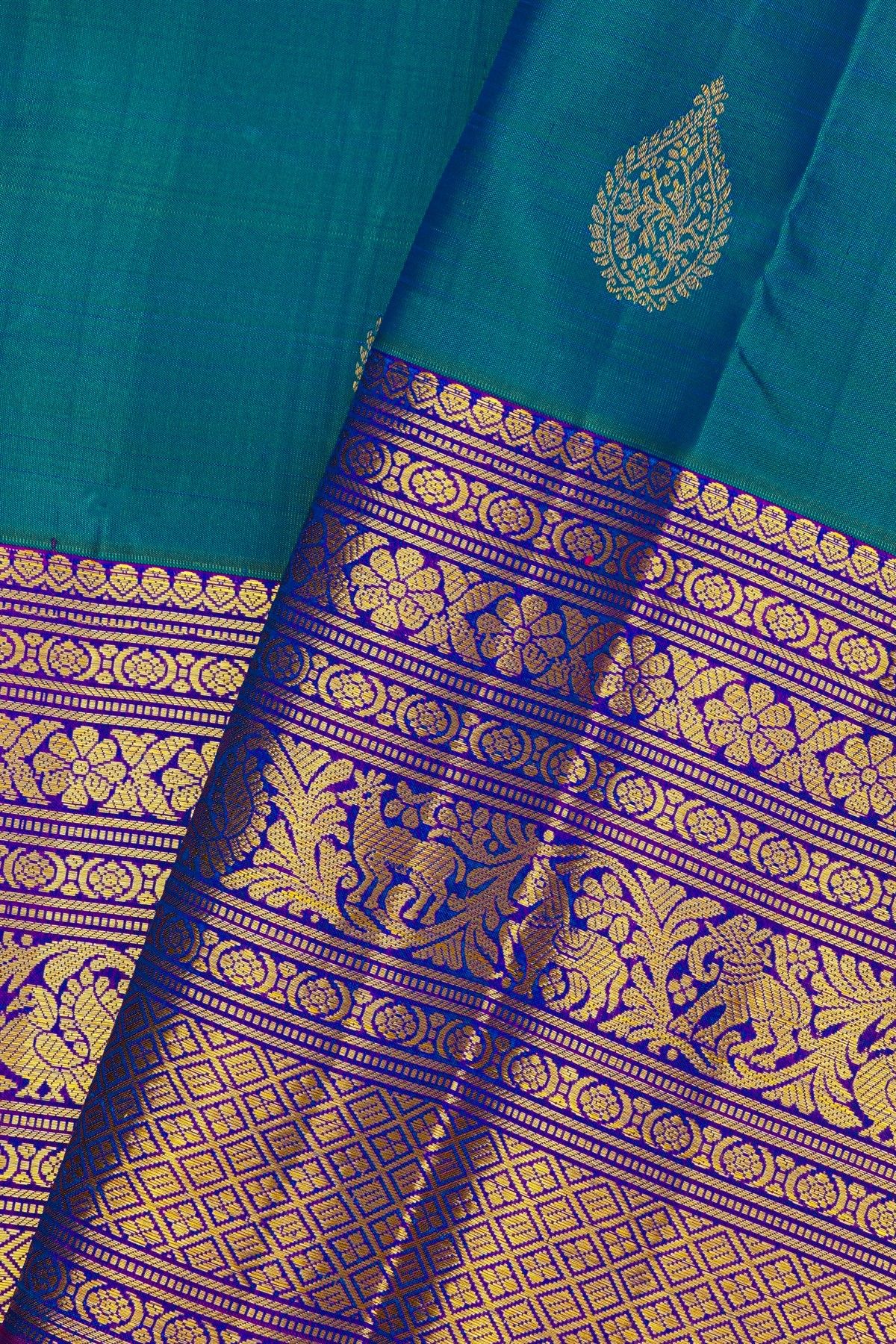 Kancheepuram Silk Blue Saree With Florals And Leaves In Zari Body