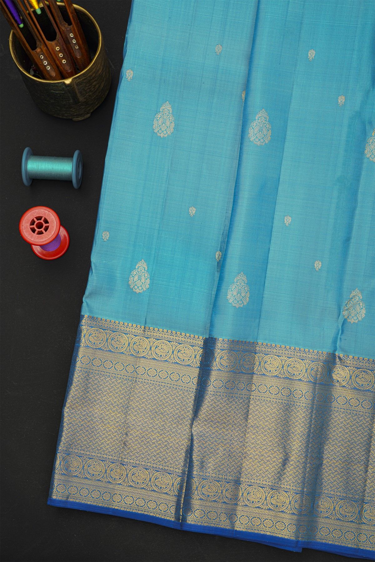 Kancheepuram Silk Sky Blue Saree With Florals And Leaves In Zari Body