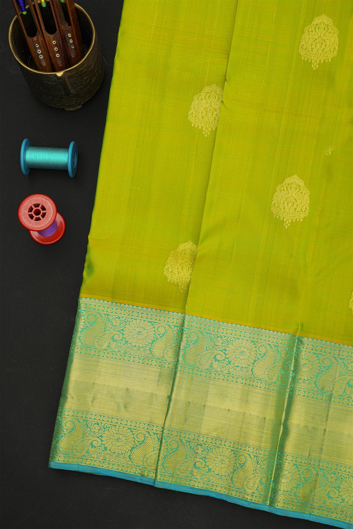Kancheepuram Silk Parrot Green Saree With Paisleys And Cross Lines Border