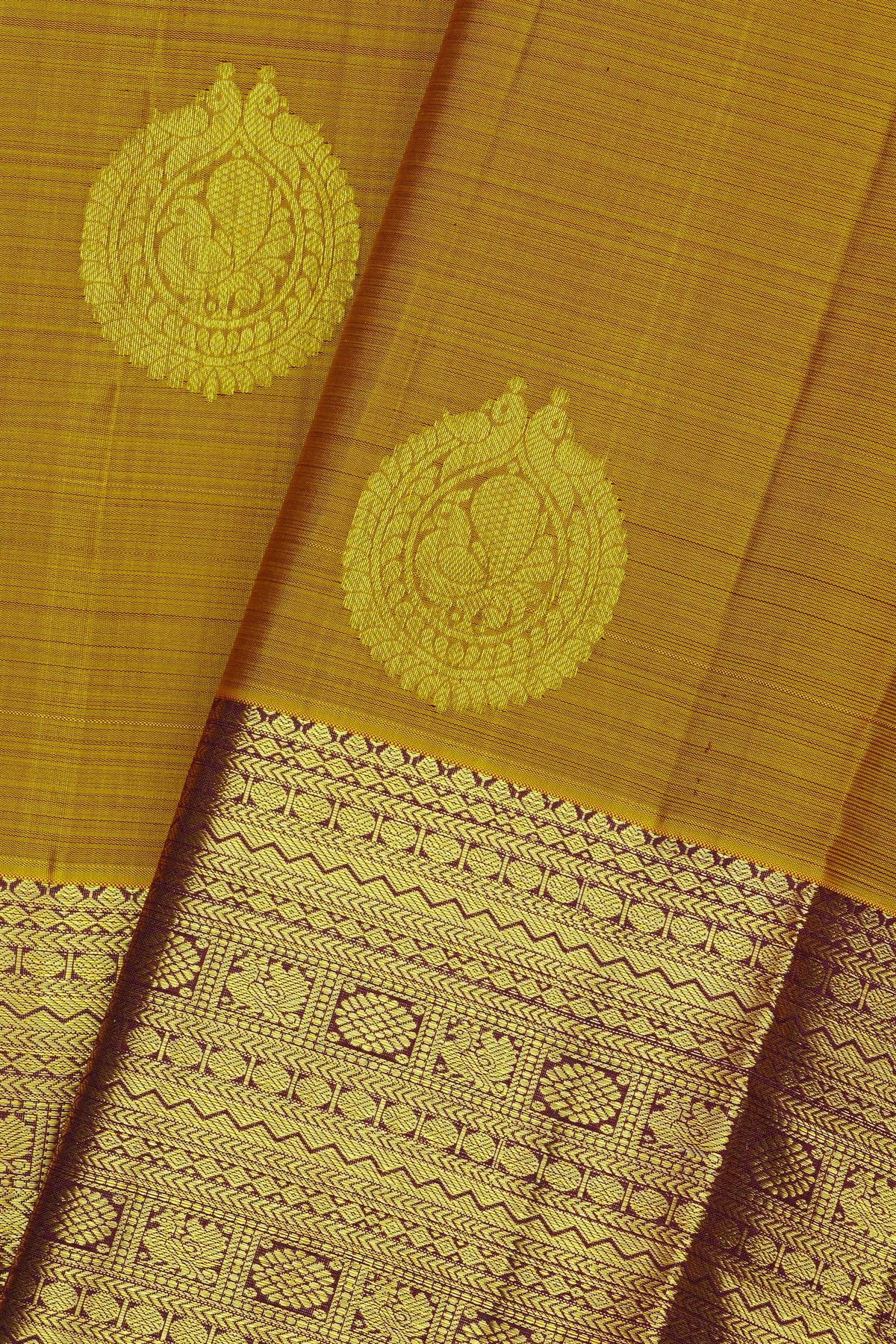Kancheepuram Silk Mustard Saree With Florals And Peacocks In Zari Body