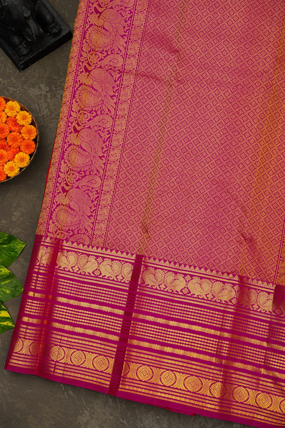 Kancheepuram Silk Orange Saree With Florals And Peacocks Buttis Border