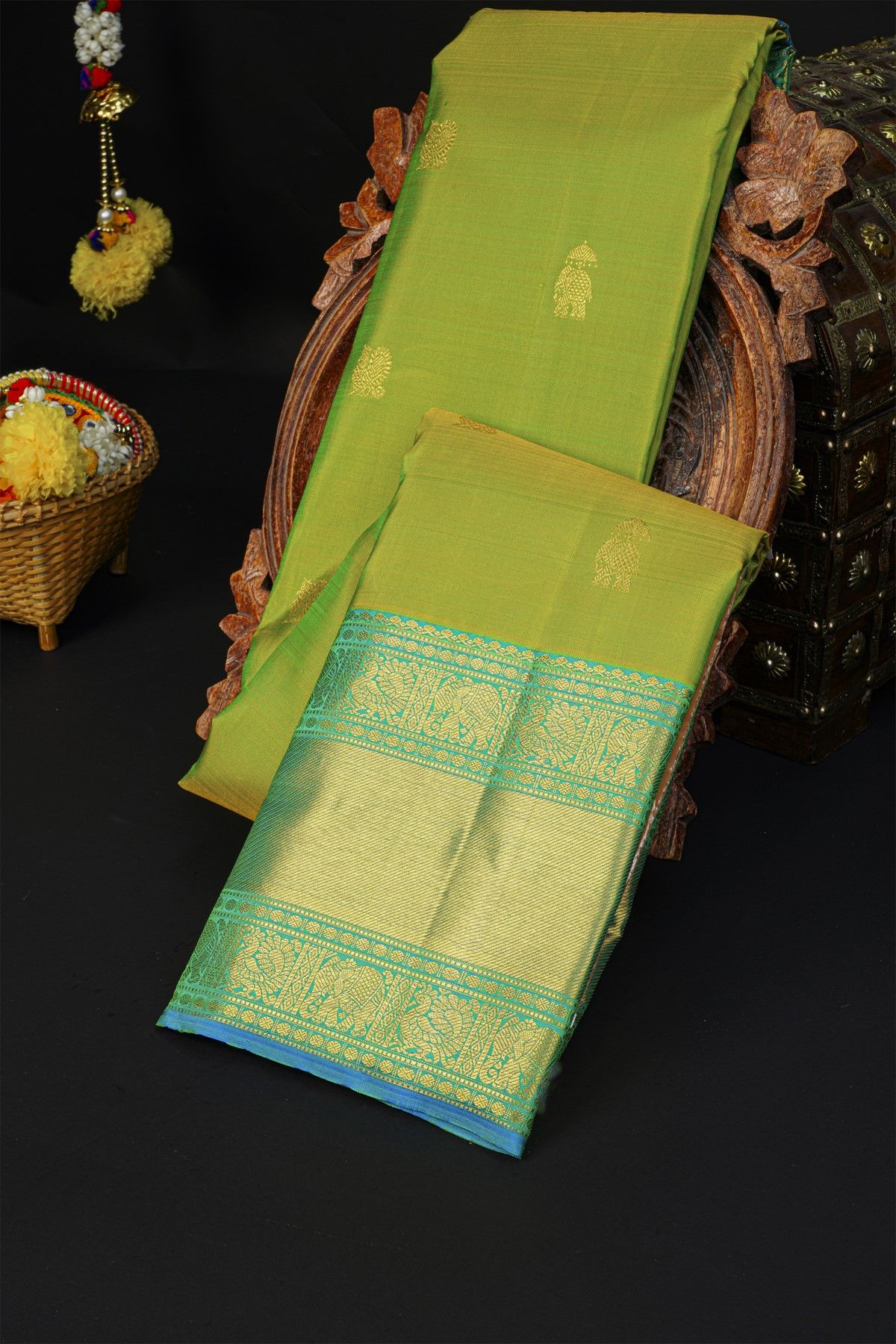 Kancheepuram Silk Parrot Green Saree With Peacock And Elephant Buttis Body