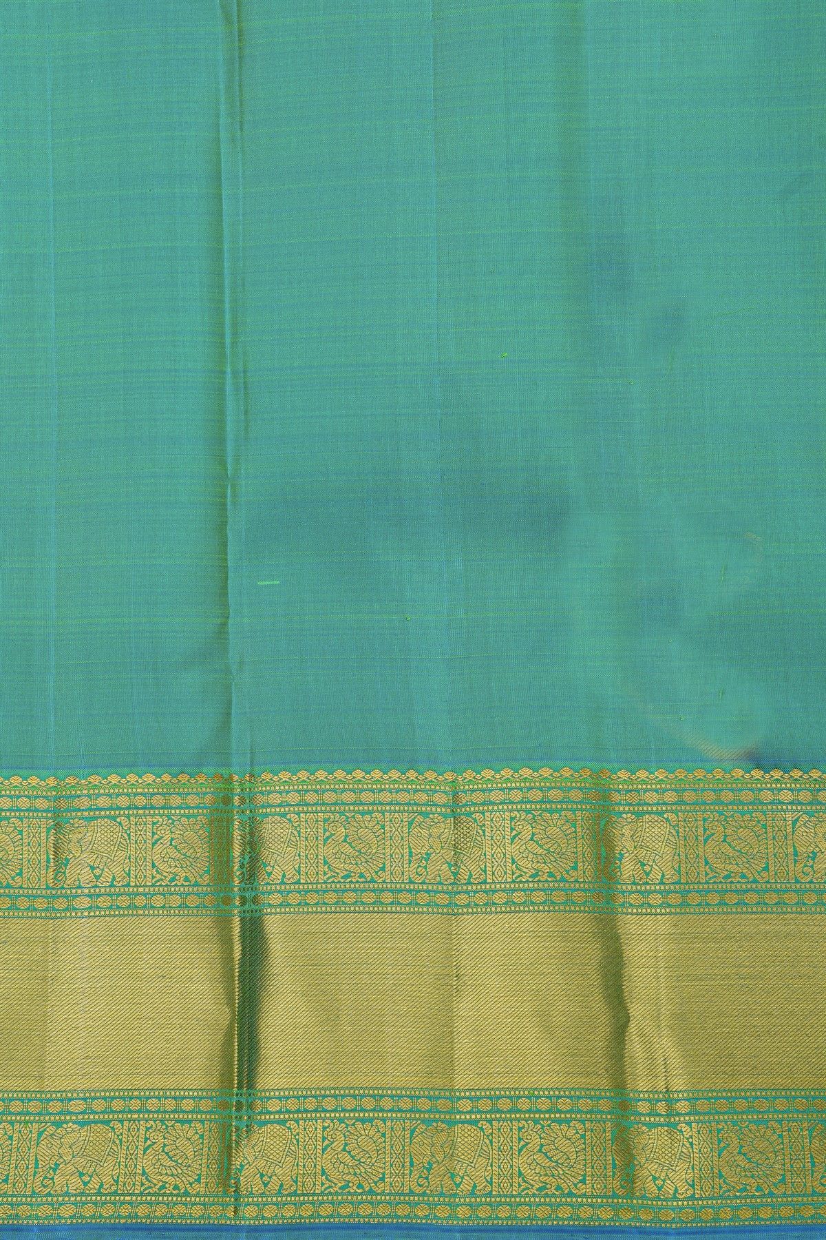 Kancheepuram Silk Parrot Green Saree With Peacock And Elephant Buttis Body