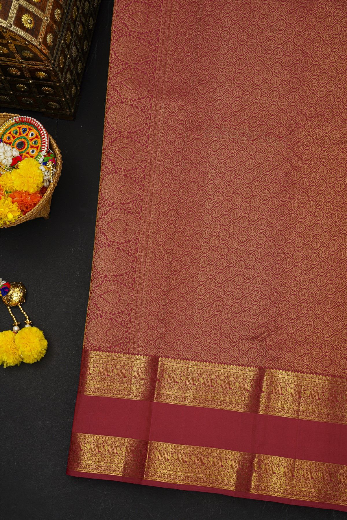 Kancheepuram Silk Black Saree With Floral Buttis Body And Gap Border