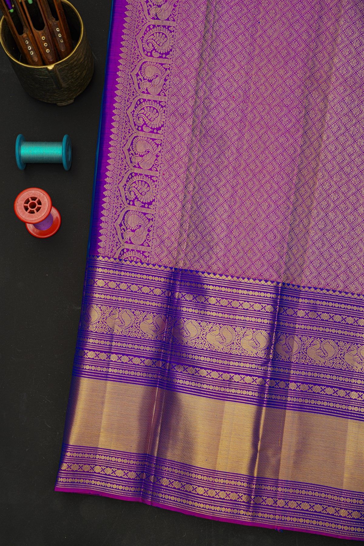 Kancheepuram Silk Blue Saree With Florals And Peacocks In Zari Body And Long Border