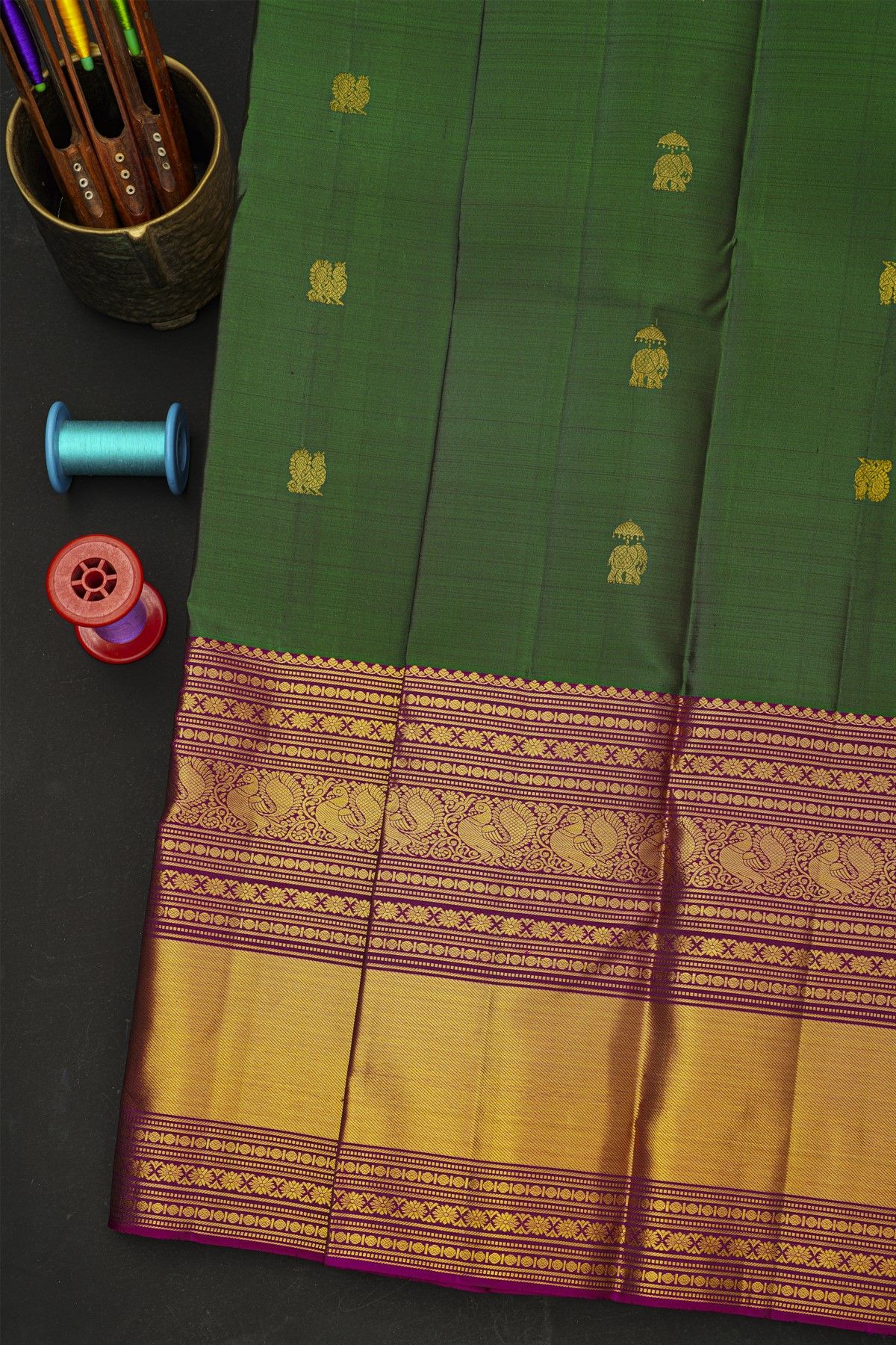 Kancheepuram Silk Bottle Green Saree With Peacocks And Elephants In Zari Body And Traditional Border