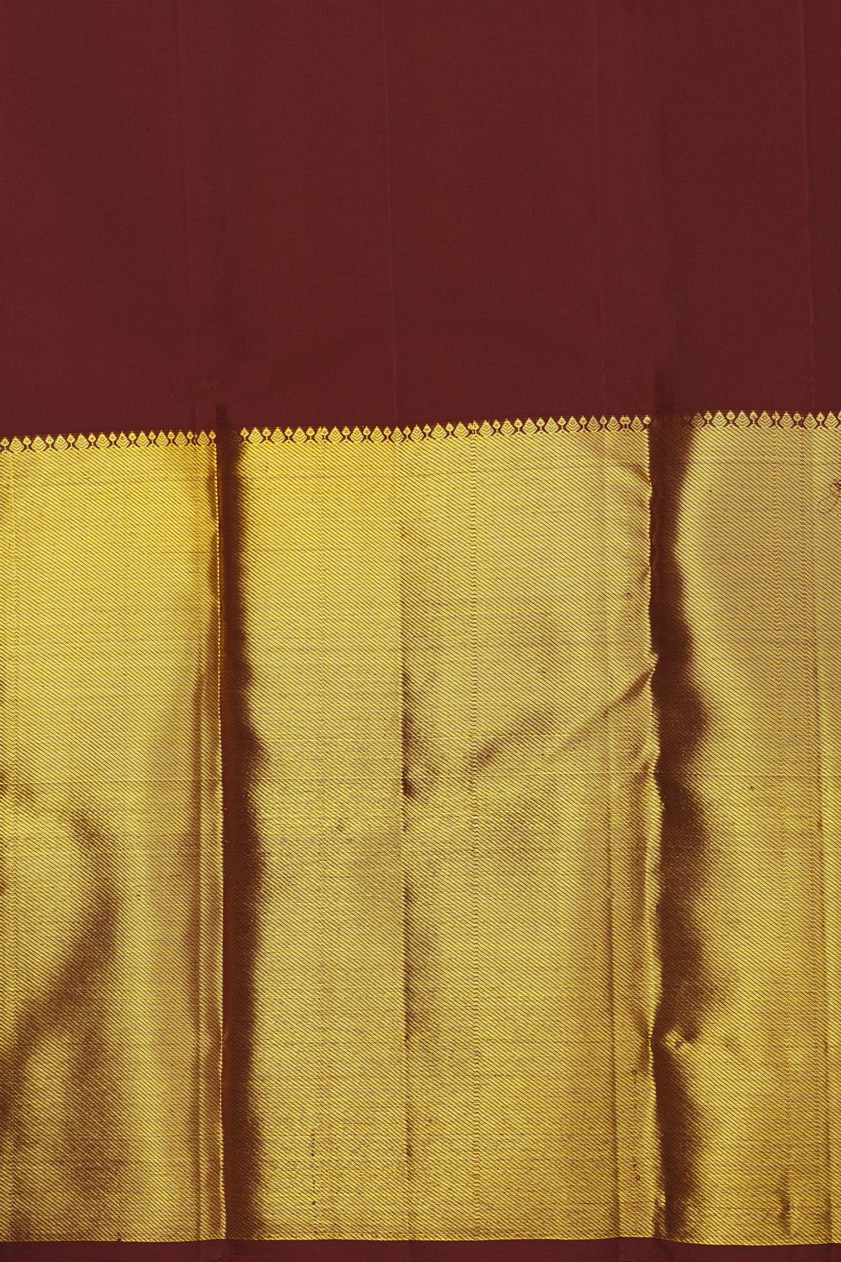 Kancheepuram Silk Maroon Saree With Florals And Leaves In Zari Body Long Kaddi Border