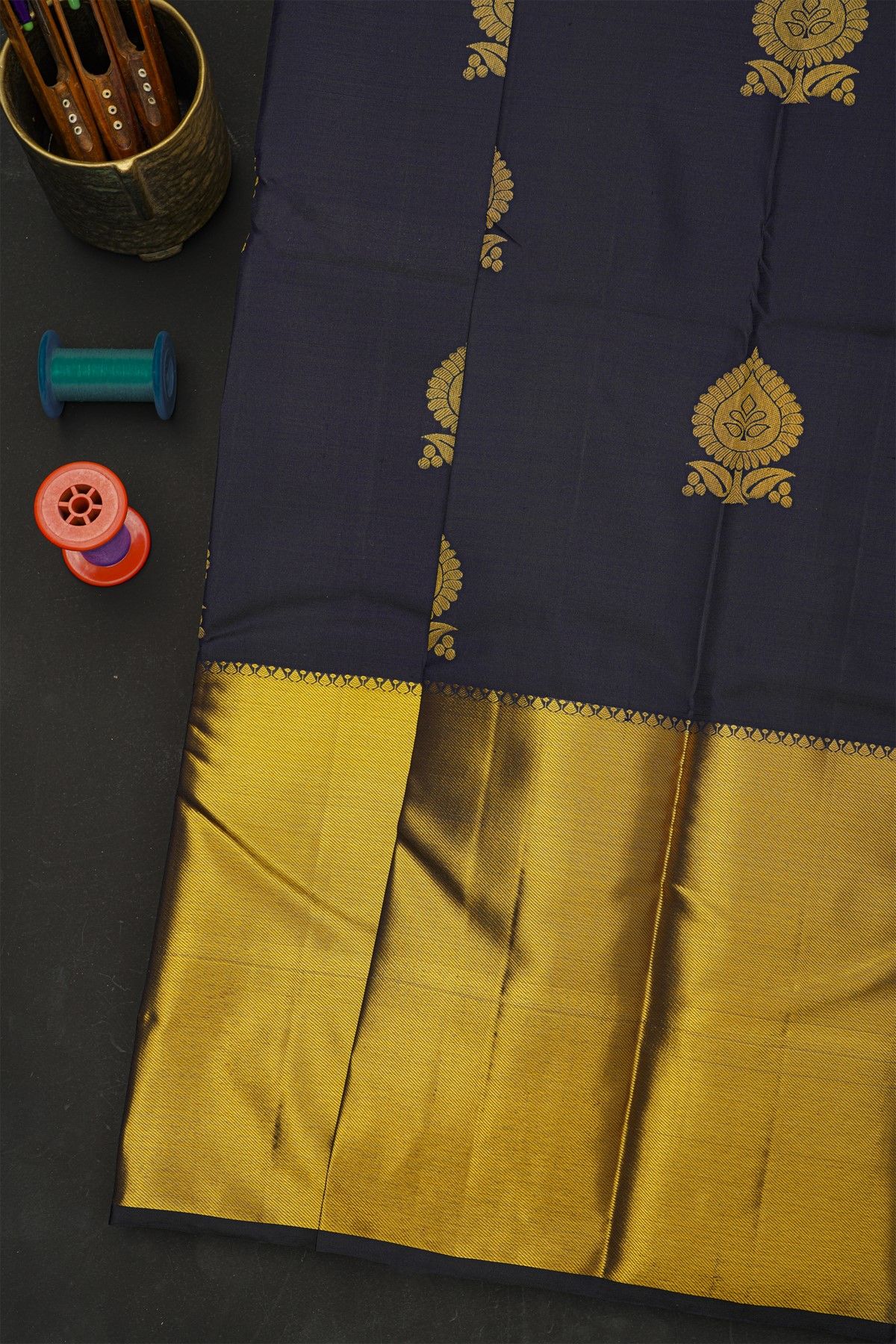 Kancheepuram Silk Navy Blue Saree With Florals And Leaves In Zari Body And Long Kaddi Border