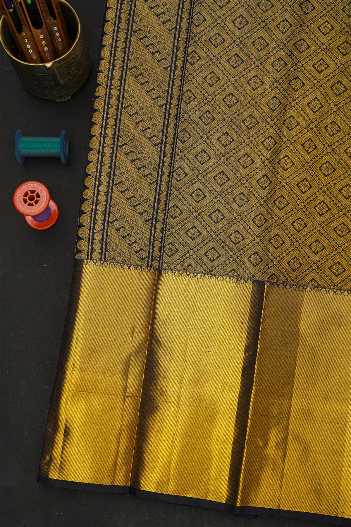 Kancheepuram Silk Navy Blue Saree With Florals And Leaves In Zari Body And Long Kaddi Border