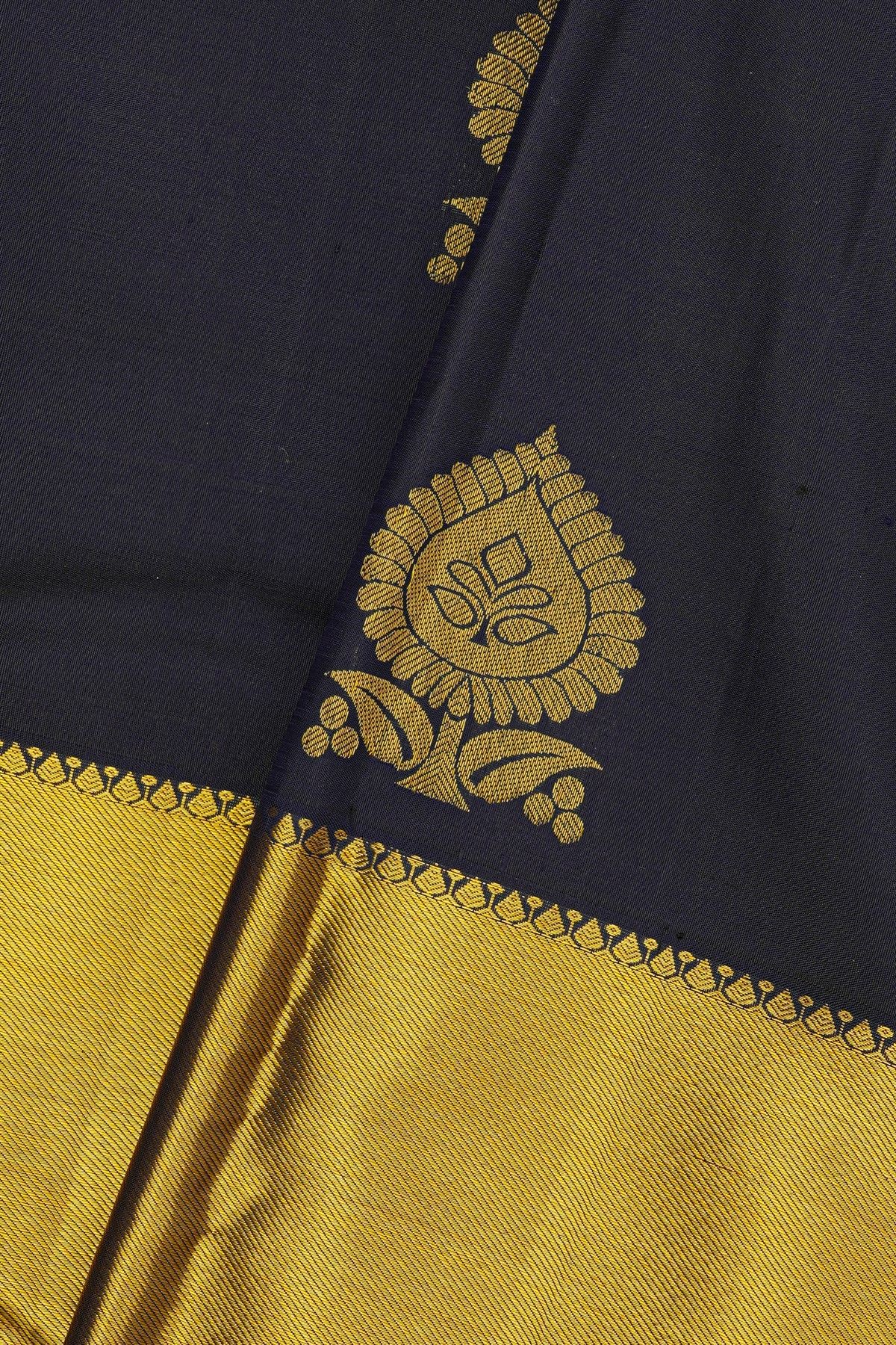 Kancheepuram Silk Navy Blue Saree With Florals And Leaves In Zari Body And Long Kaddi Border