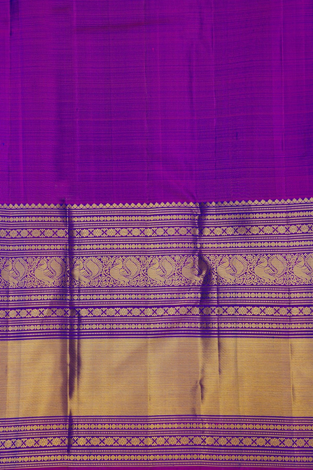 Kancheepuram Silk Blue Saree With Florals And Peacock Buttis In Zari Body