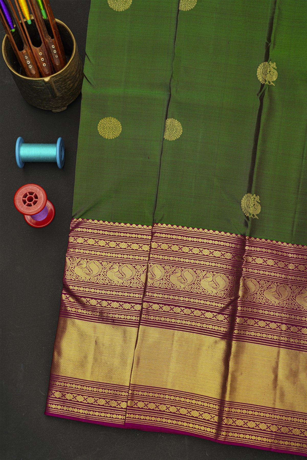 Kancheepuram Silk Bottle Green Saree With Florals And Peacocks In Zari Body