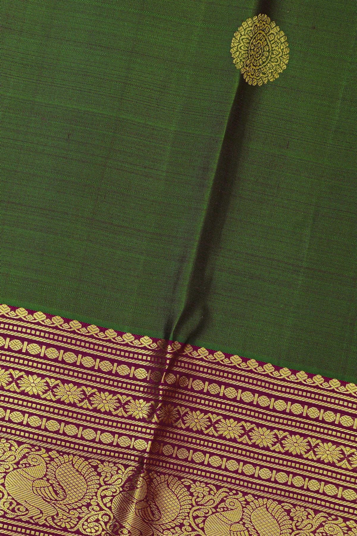 Kancheepuram Silk Bottle Green Saree With Florals And Peacocks In Zari Body