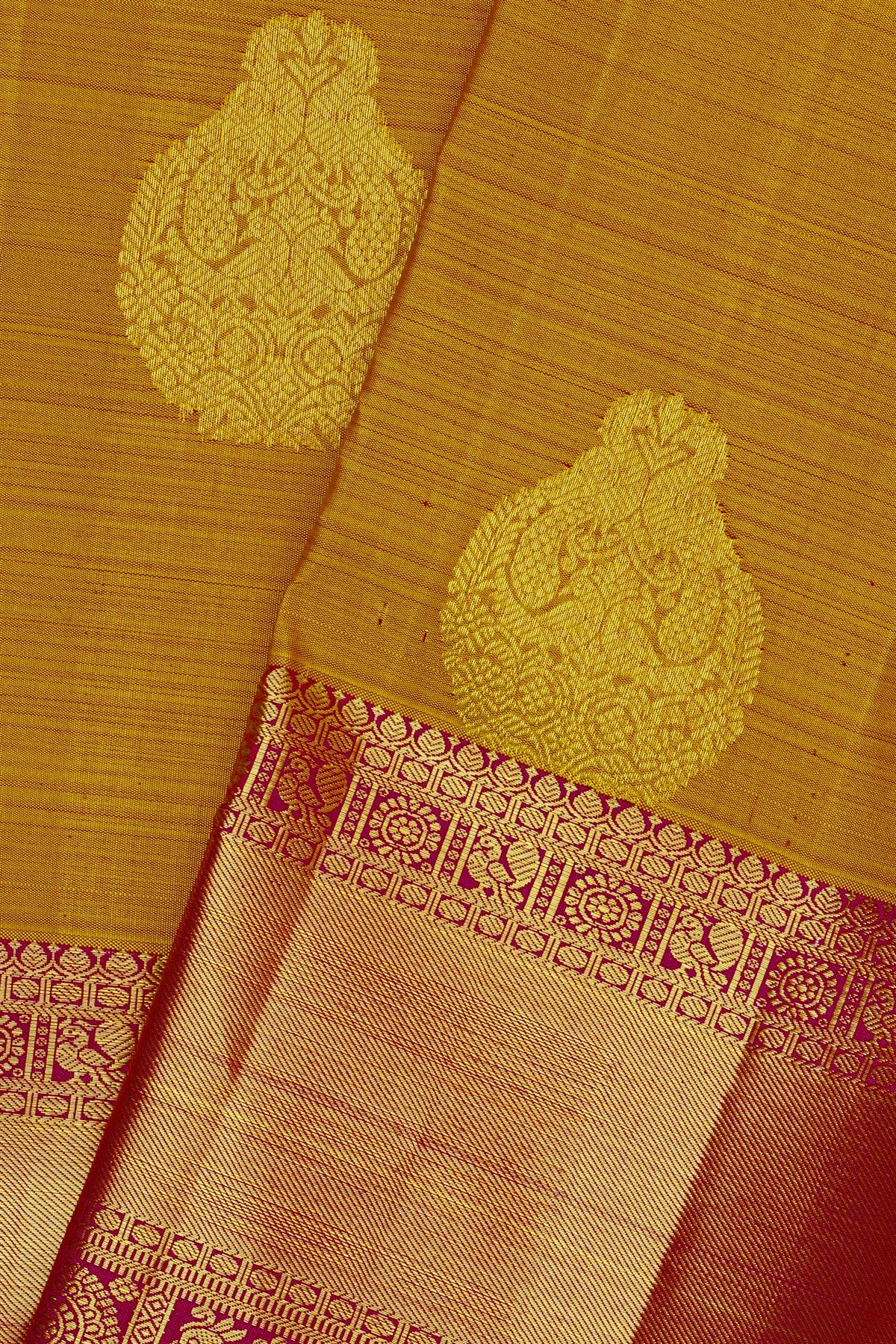 Kancheepuram Silk Mustard Yellow Saree With Florals Leaves And Peacocks In Zari Body
