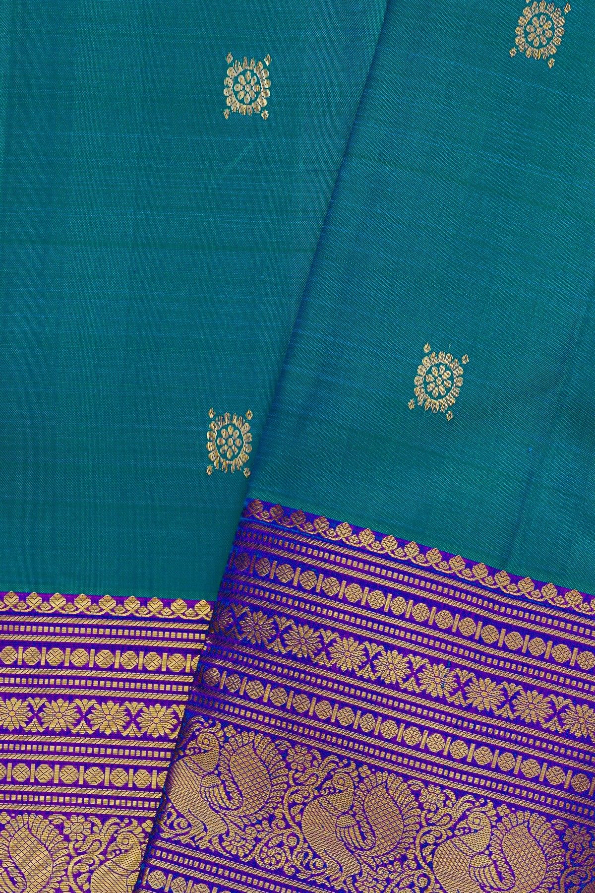 Kancheepuram Silk Peacock Blue Saree With Florals And Buttis Body