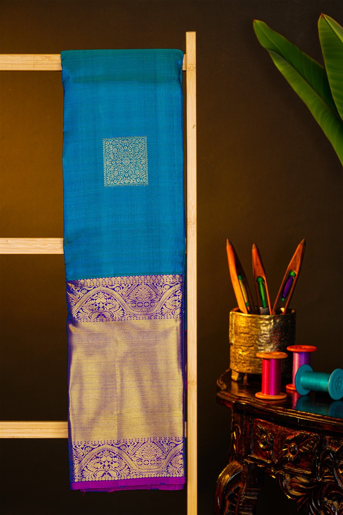 Kancheepuram Silk Peacock Blue Saree With Florals And Leaves Body And Kaddi Border