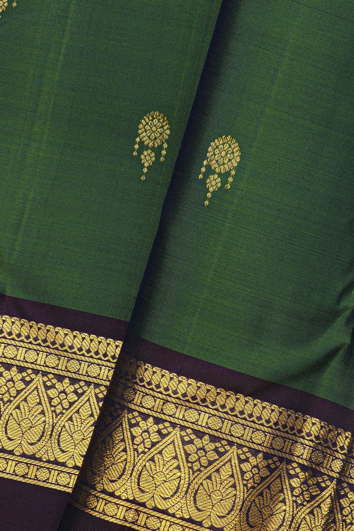 Kancheepuram Silk Bottle Green Saree With Florals And Buttis Body