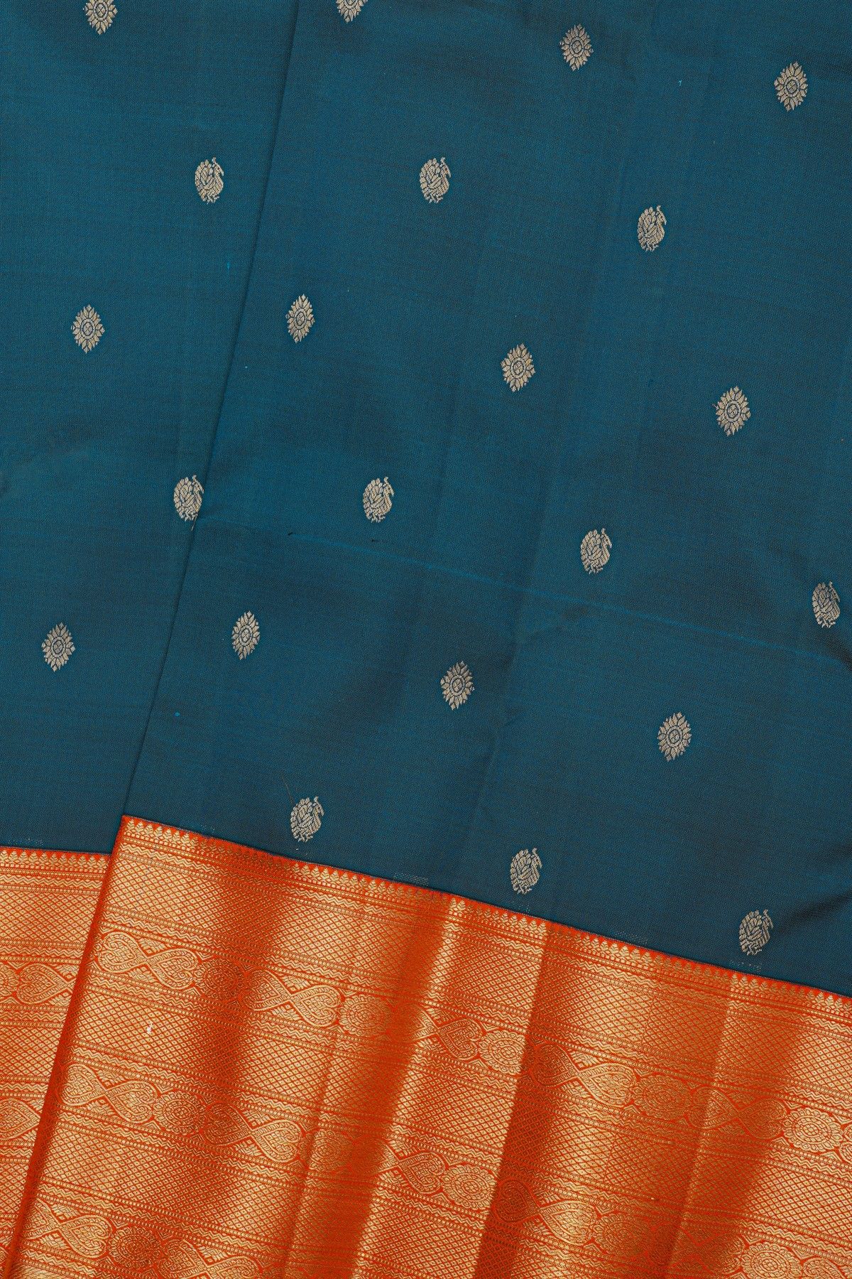 Kancheepuram Silk Peacock Blue Saree With Florals And Peacocks Buttis Body