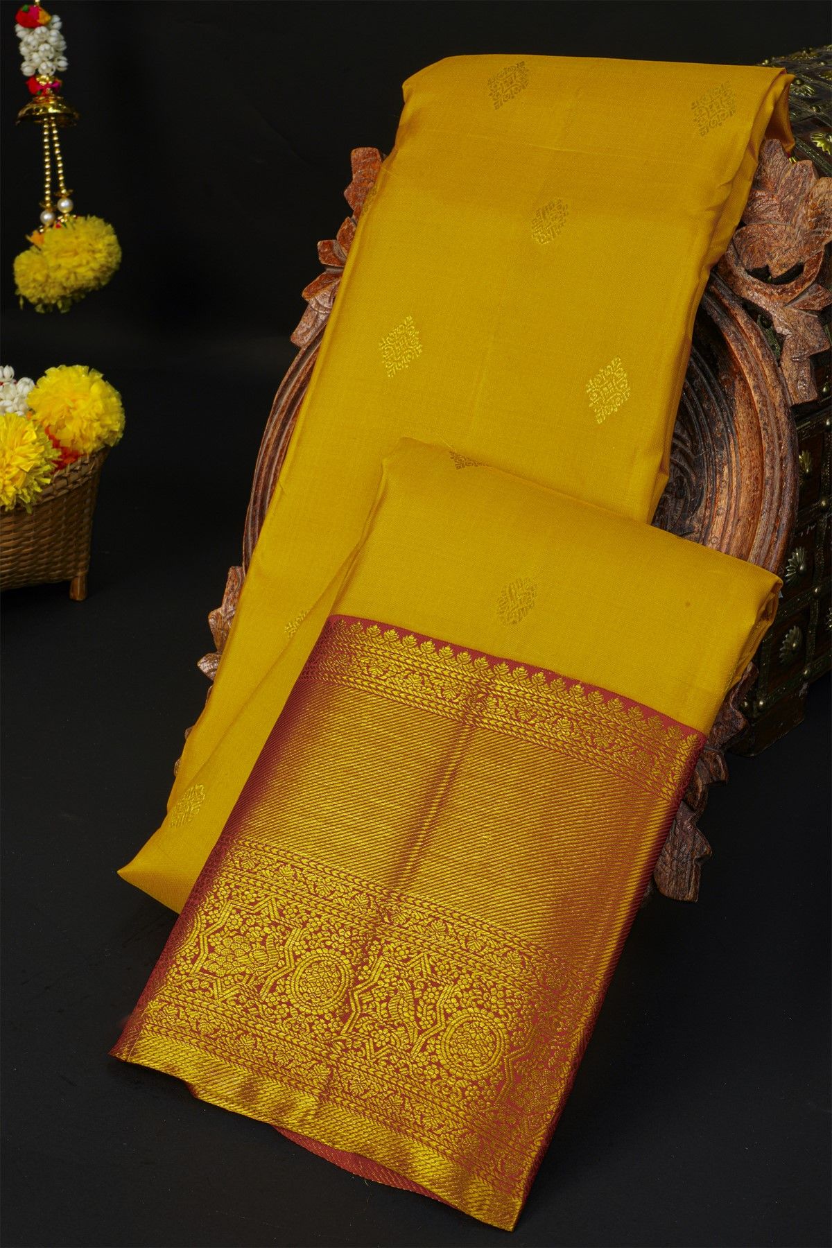 Kancheepuram Silk Mustard Saree With Cross Lines Florals And Peacocks Border