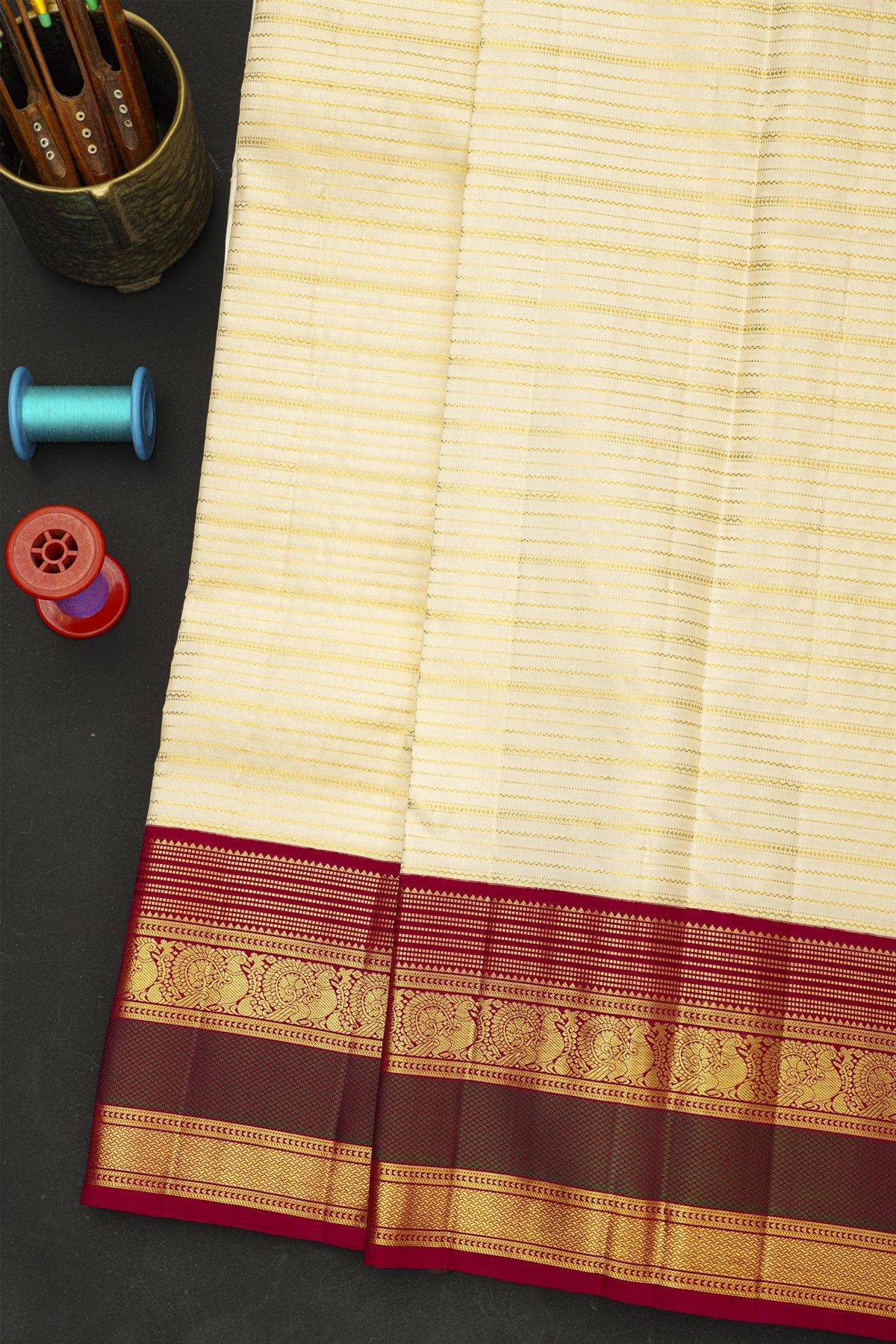 Kancheepuram Silk Off White Saree With Diamonds And Peacock Border
