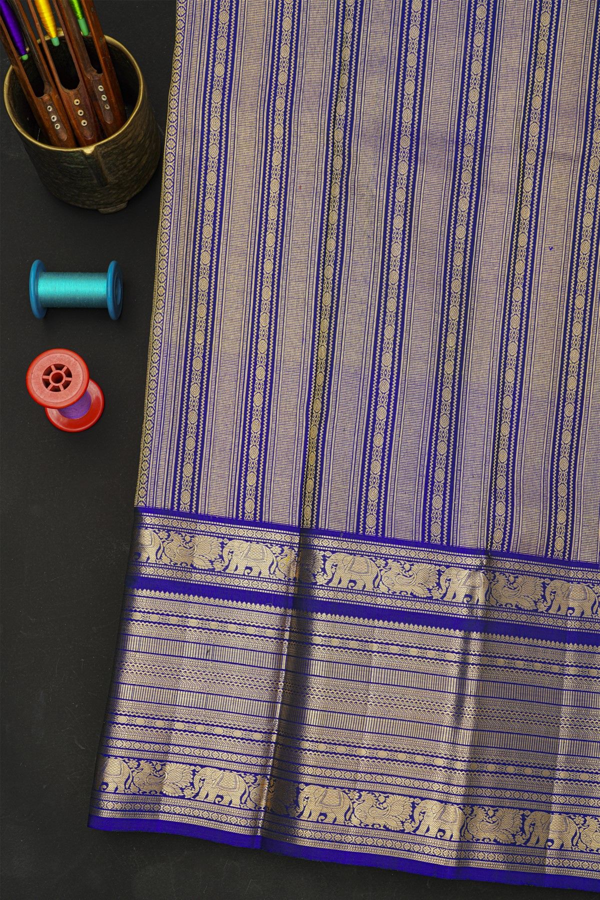 Kancheepuram Silk Leaf Green Saree With Zari Checks And Floral Buttis Body