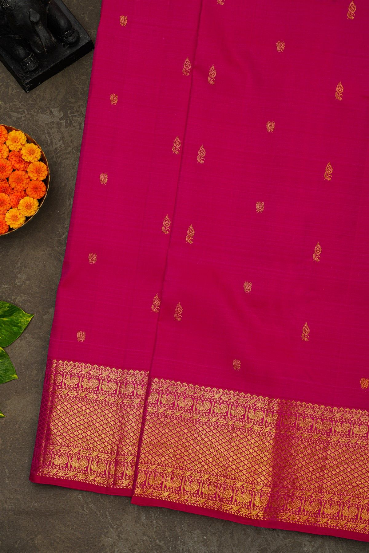 Kancheepuram Silk Rani Pink Saree With Florals And Peacock Buttis Body