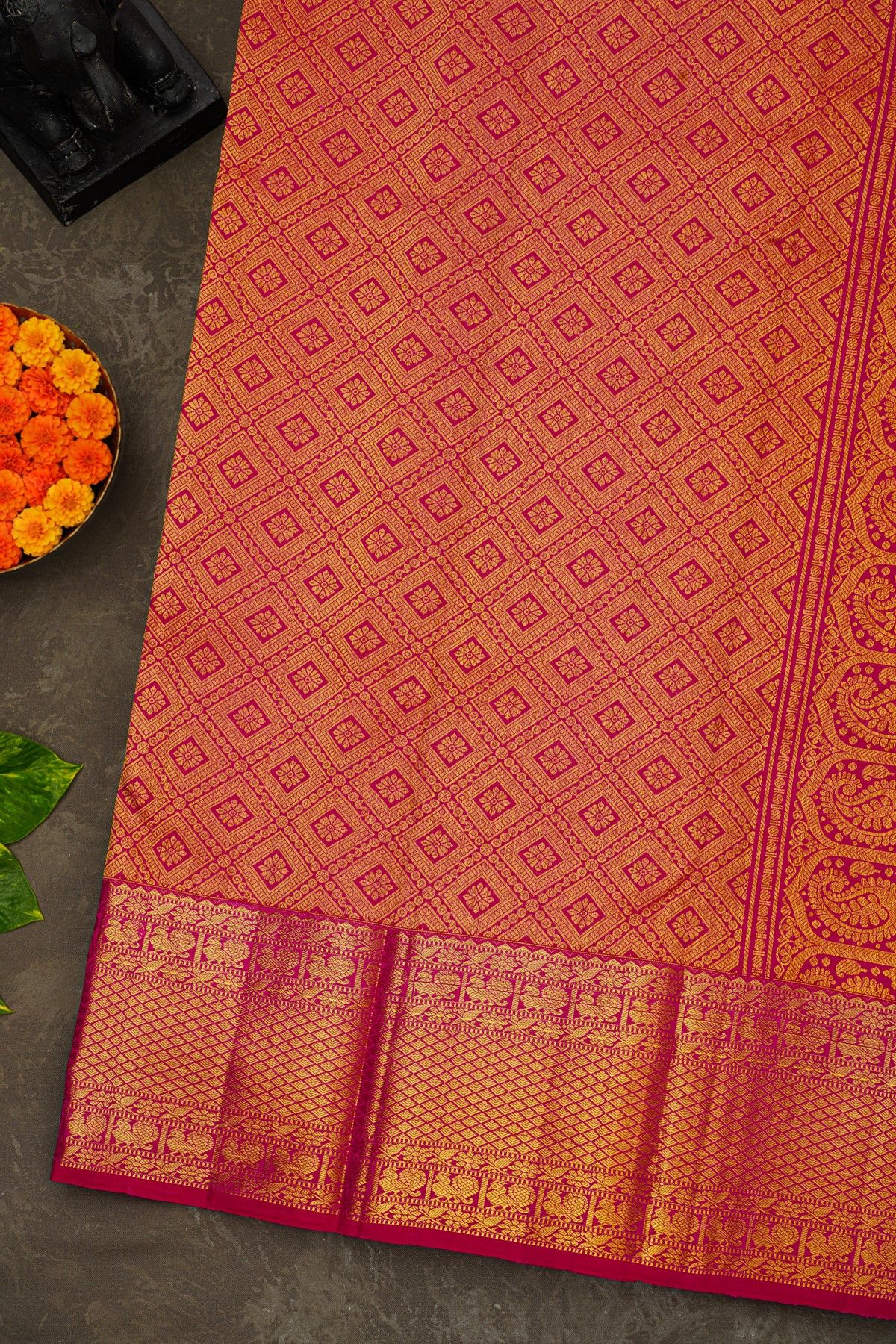 Kancheepuram Silk Rani Pink Saree With Florals And Peacock Buttis Body