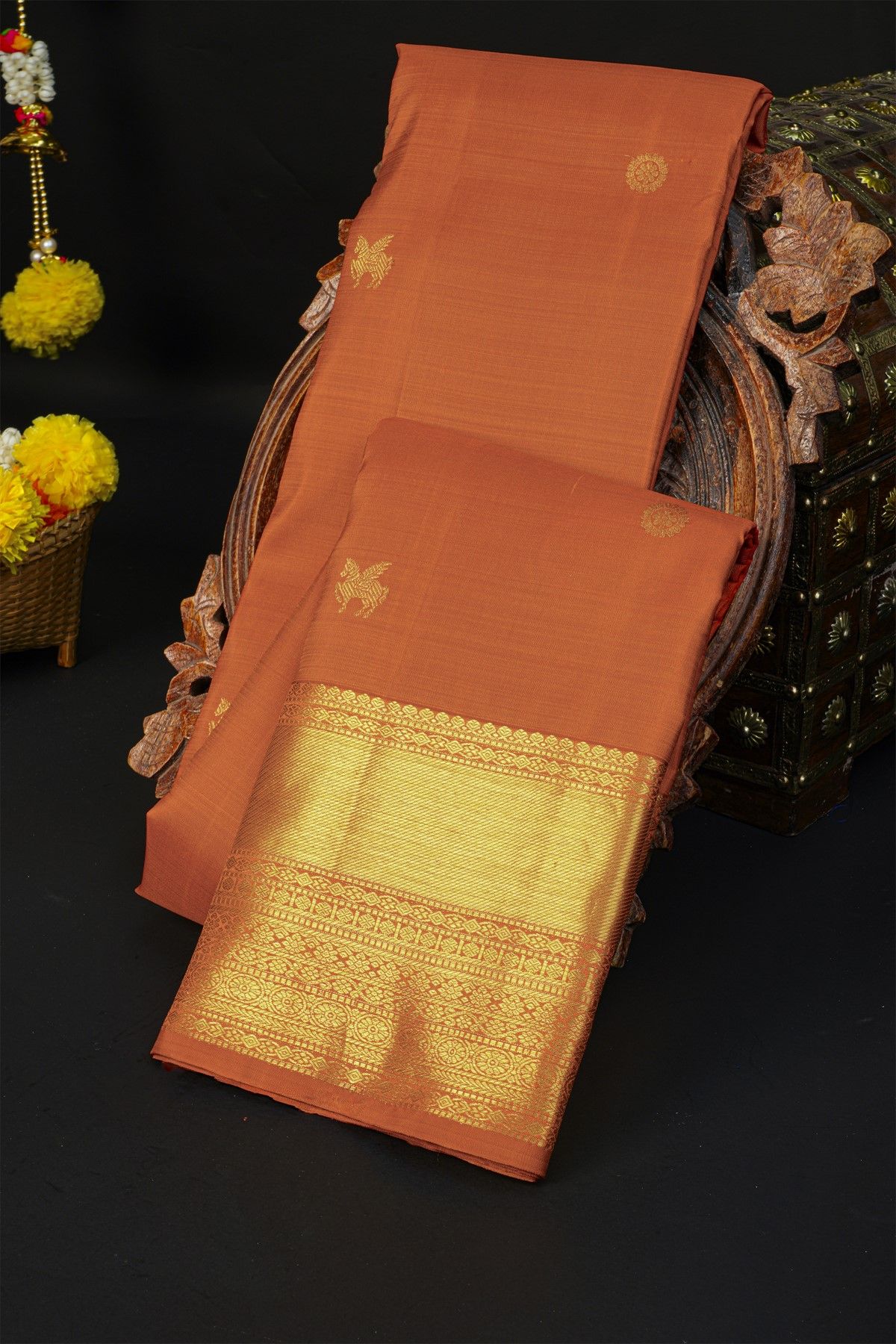 Kancheepuram Silk Rust Saree With Florals And Unicorn Buttis Body