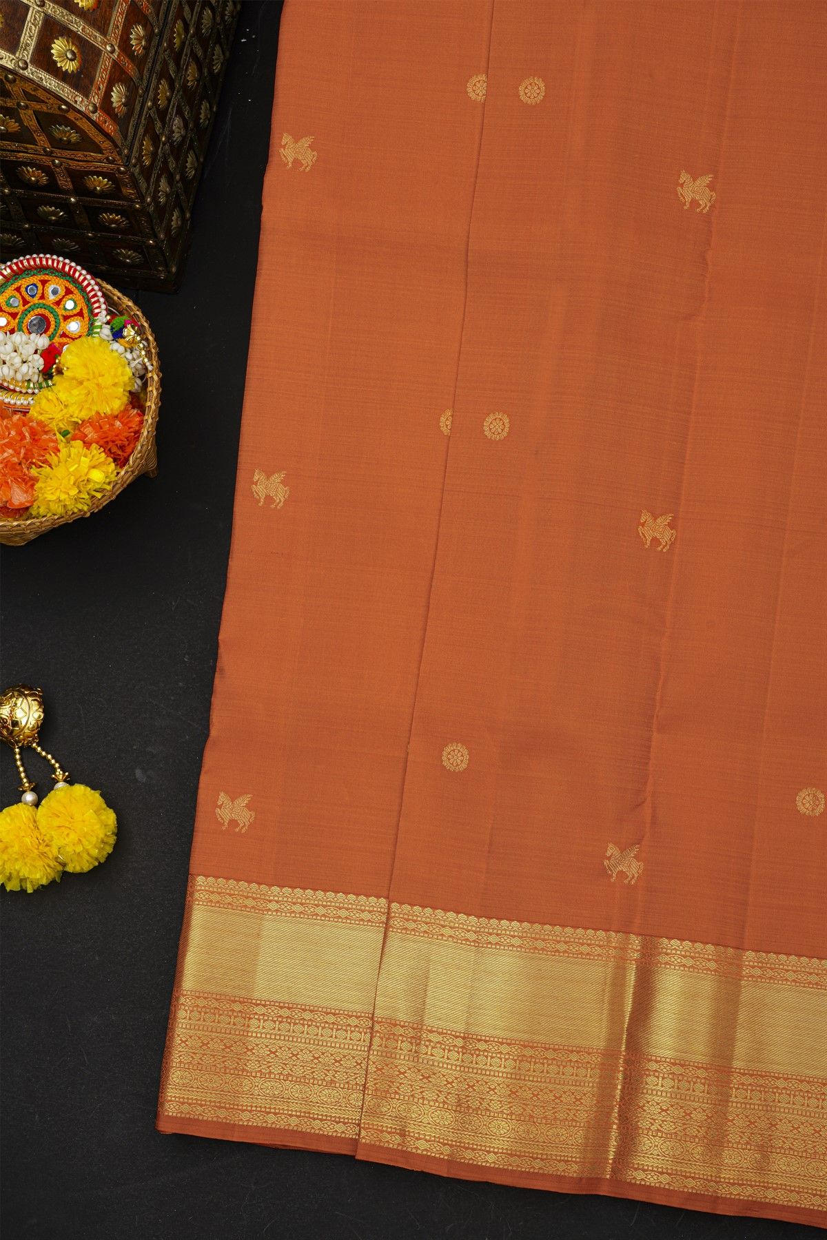 Kancheepuram Silk Rust Saree With Florals And Unicorn Buttis Body