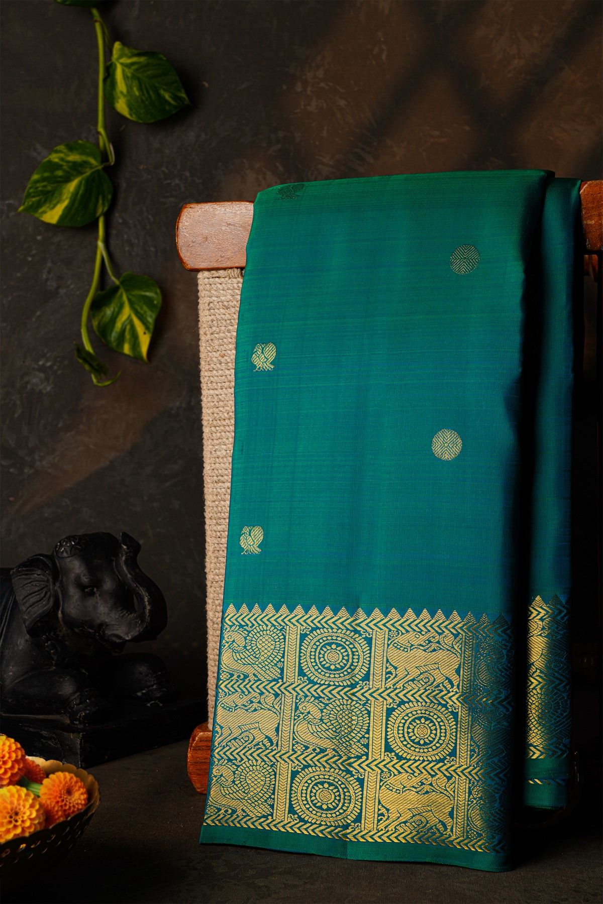 Kancheepuram Silk Teal Green Saree With Florals Peacocks And Yalli Border
