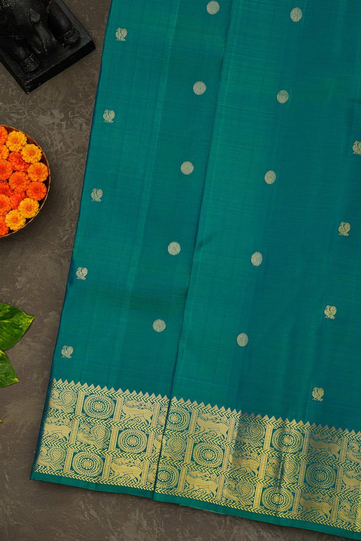 Kancheepuram Silk Teal Green Saree With Florals Peacocks And Yalli Border