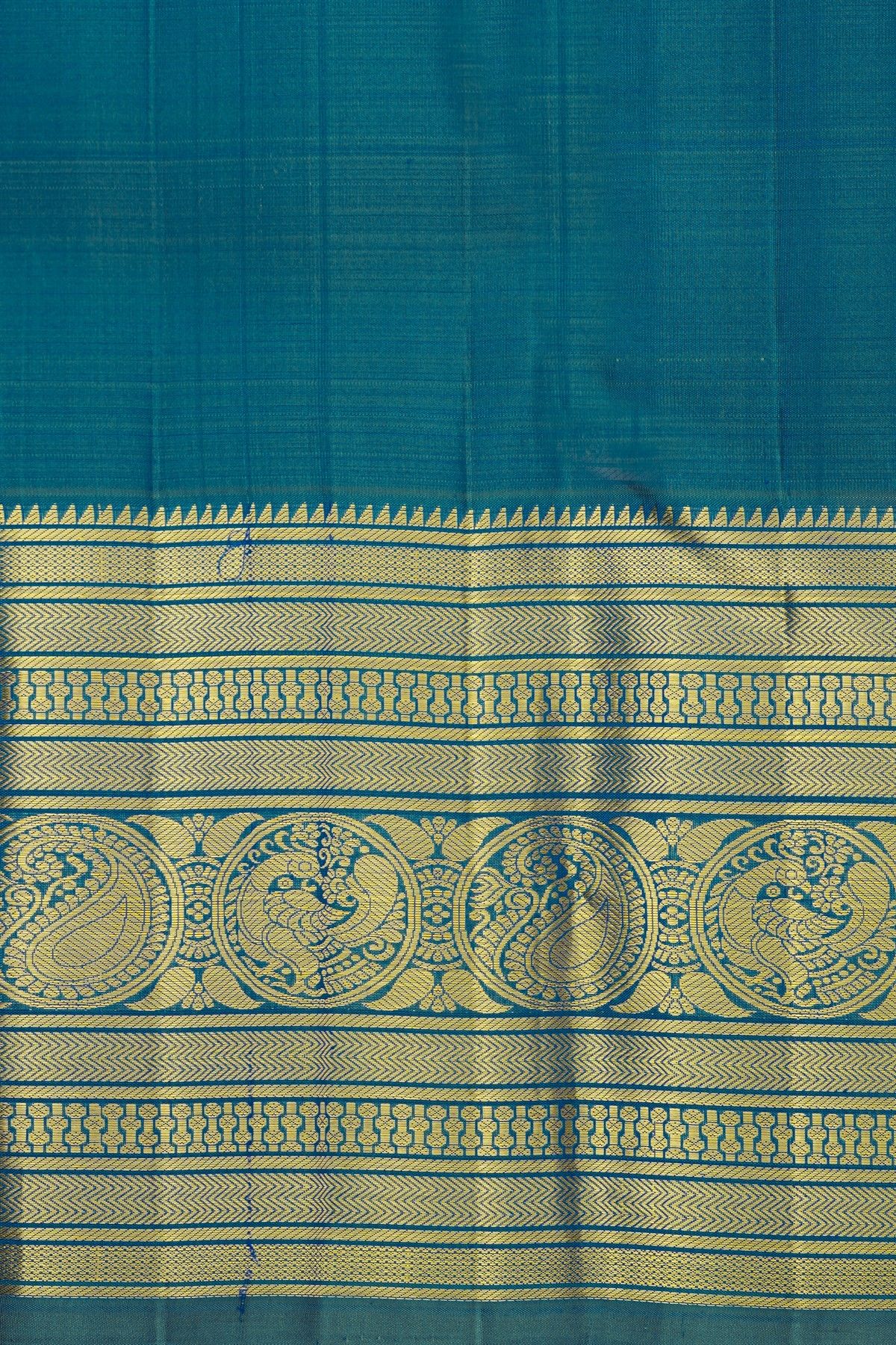 Kancheepuram Silk Teal Blue Saree With Florals And Buttis Body