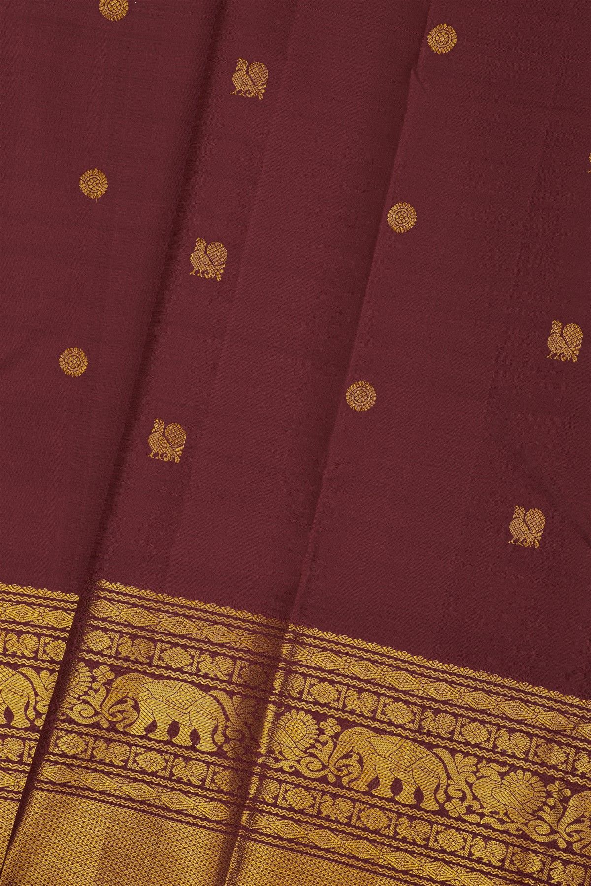 Kancheepuram Silk Wine Saree With Florals And Peacocks Buttis Body