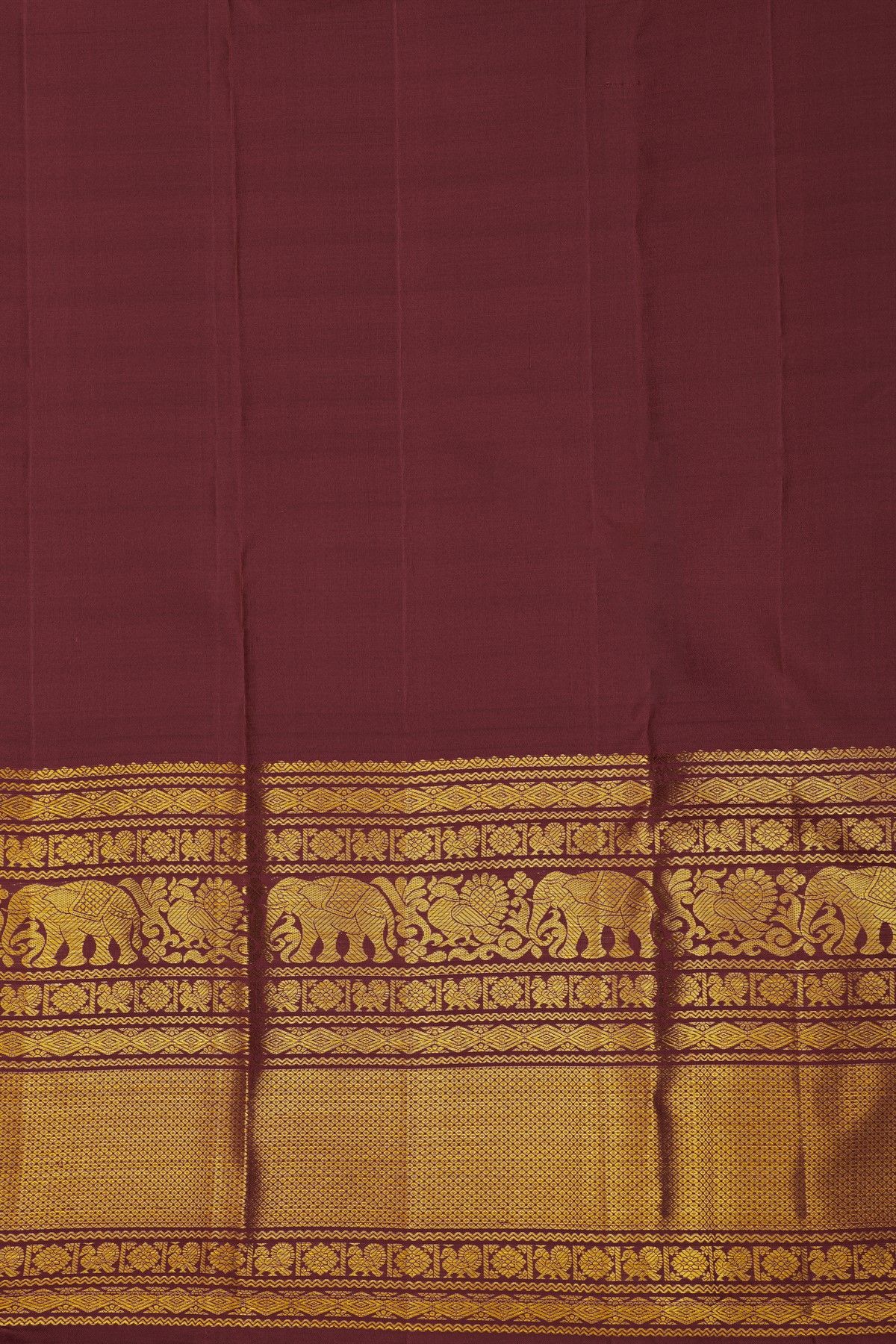 Kancheepuram Silk Wine Saree With Florals And Peacocks Buttis Body