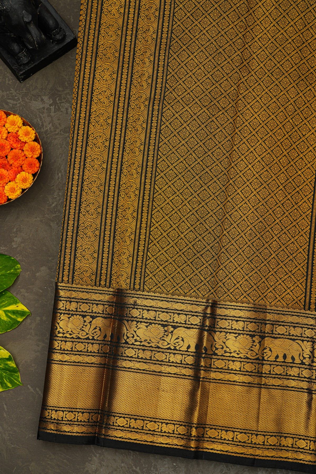 Kancheepuram Silk Black Saree With Florals And Peacock Buttis Body