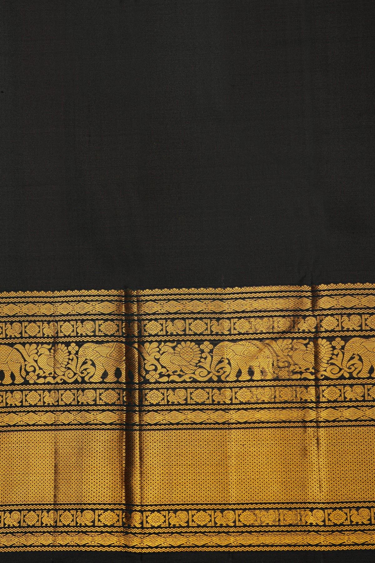 Kancheepuram Silk Black Saree With Florals And Peacock Buttis Body