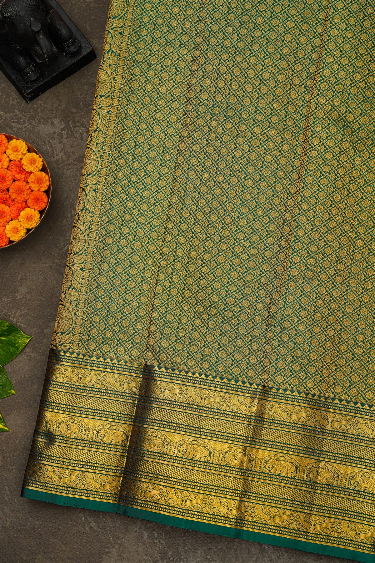 Kancheepuram Silk Bottle Green Saree With Floral Peacock And Elephant Zari Border