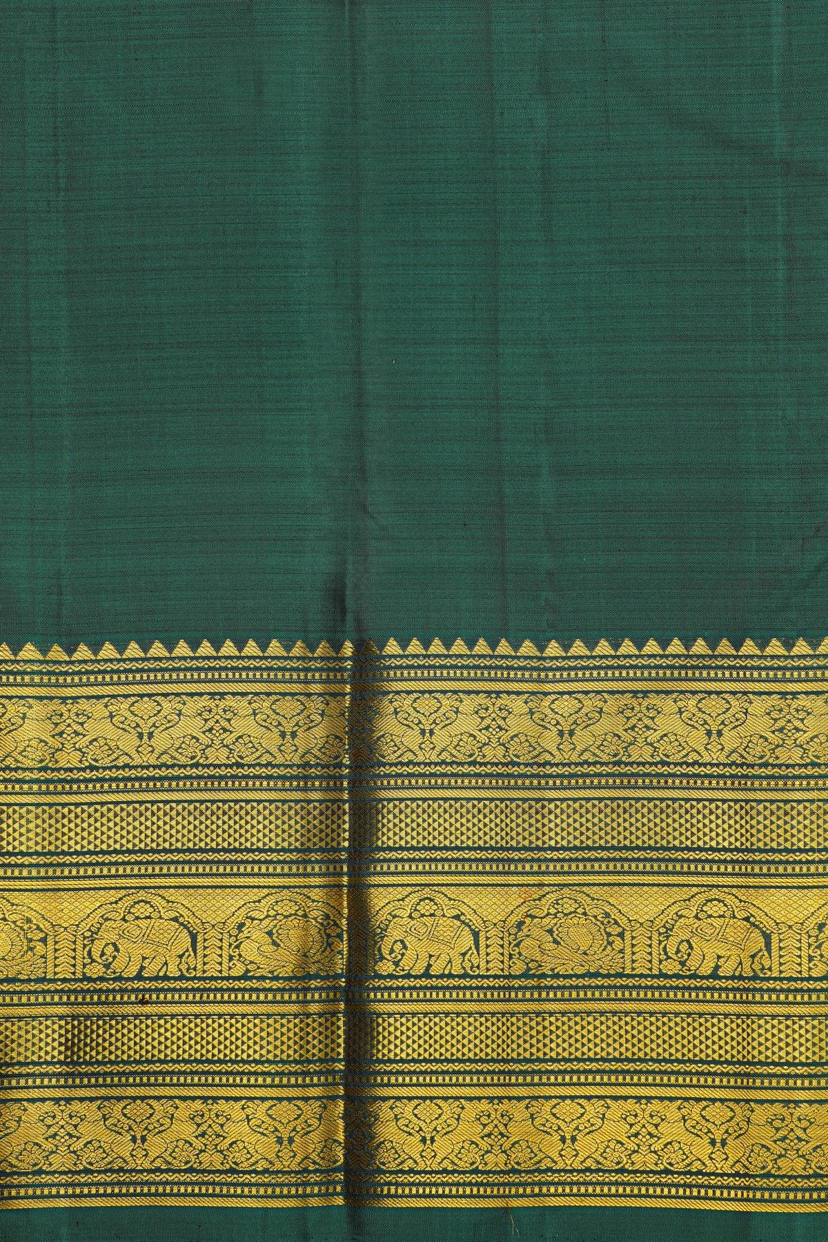 Kancheepuram Silk Bottle Green Saree With Floral Peacock And Elephant Zari Border