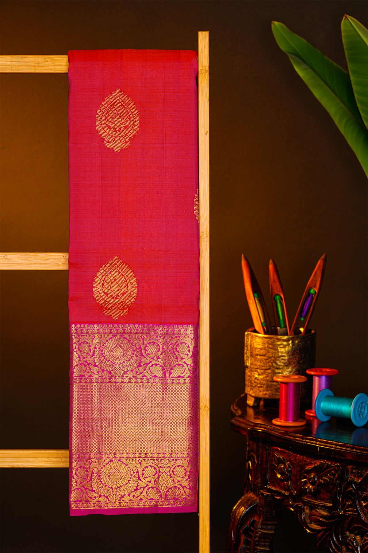 Kancheepuram Silk Reddish Pink Saree With Florals And Buttis Body