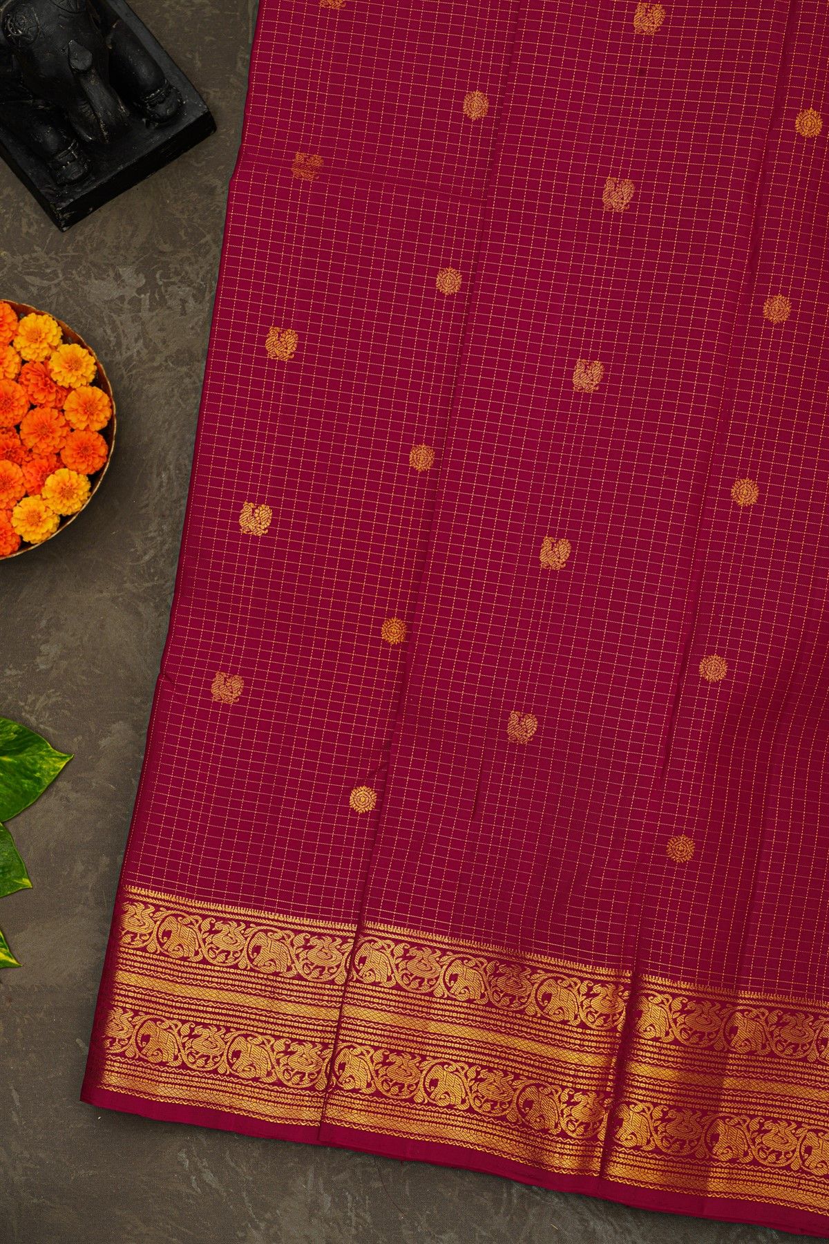 Kancheepuram Silk Magenta Saree With Zari Checks Floral And Peacock Buttis Body
