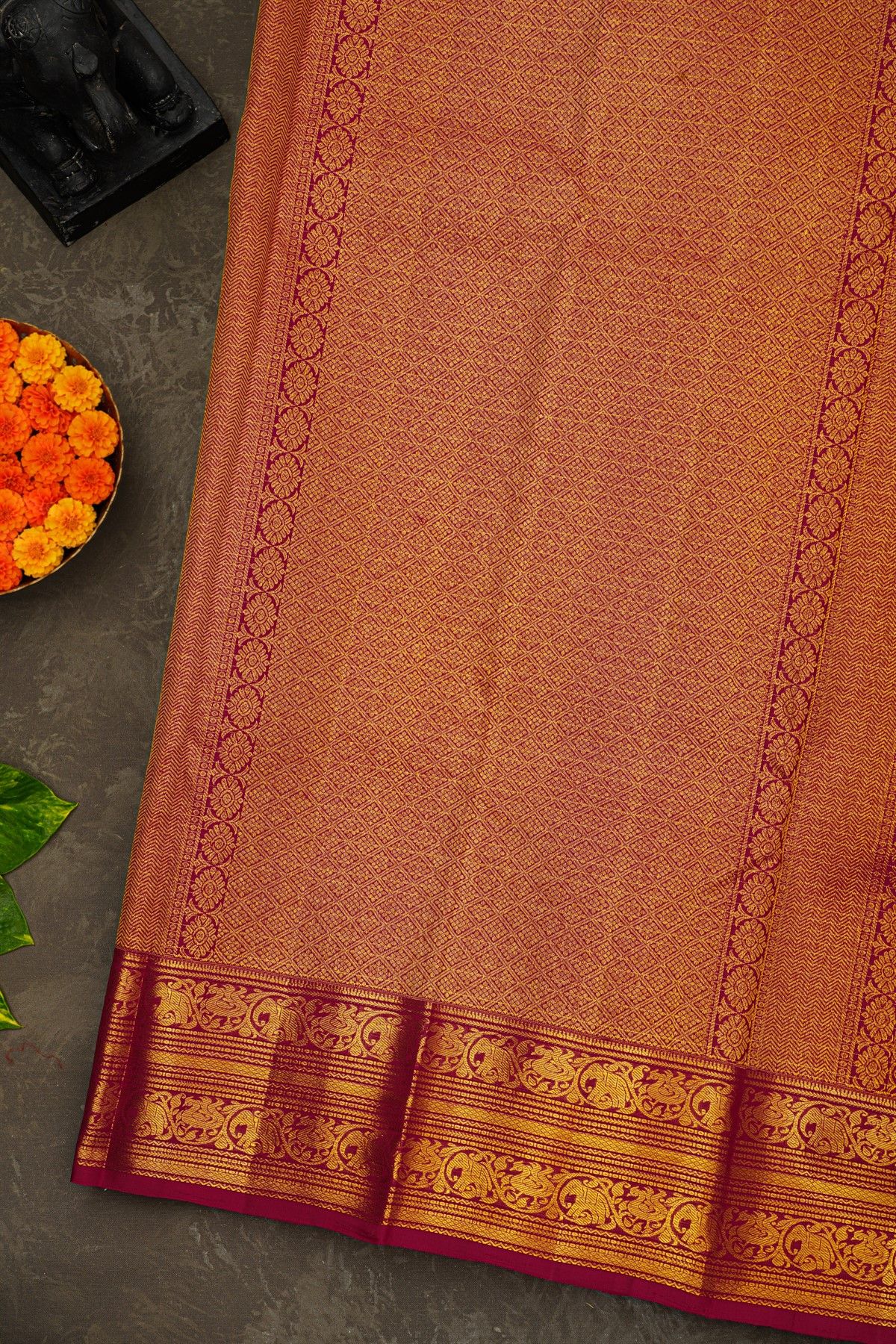 Kancheepuram Silk Magenta Saree With Zari Checks Floral And Peacock Buttis Body