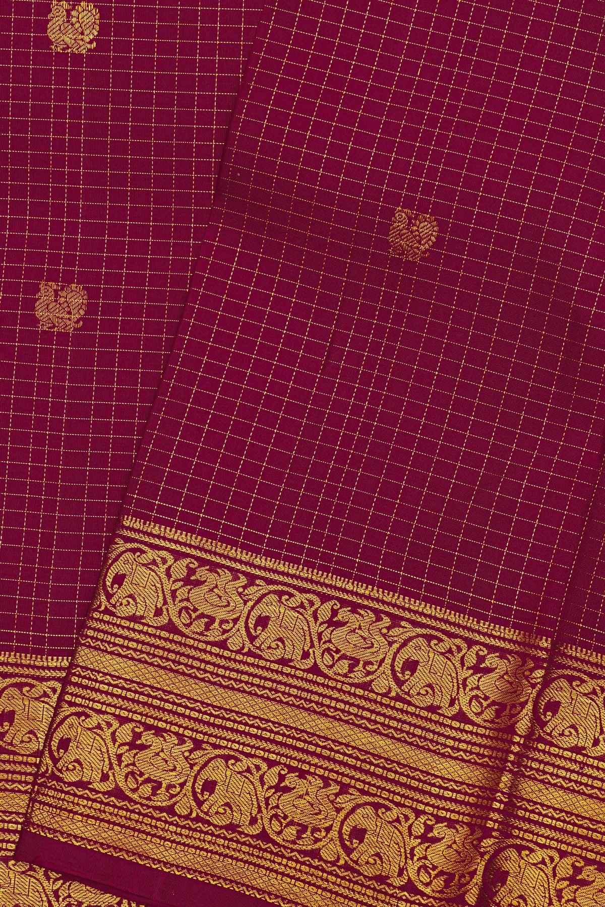 Kancheepuram Silk Magenta Saree With Zari Checks Floral And Peacock Buttis Body