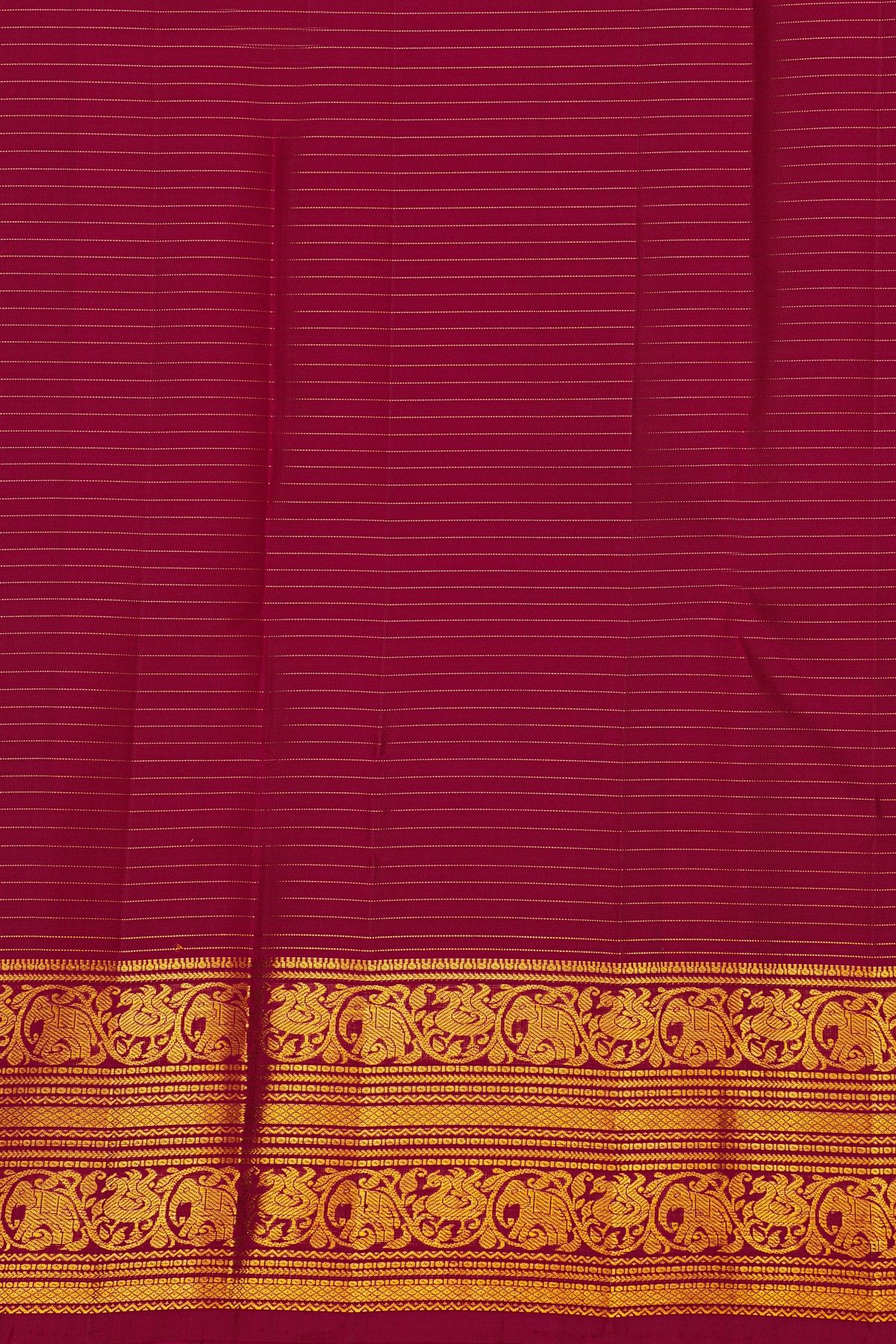 Kancheepuram Silk Magenta Saree With Zari Checks Floral And Peacock Buttis Body