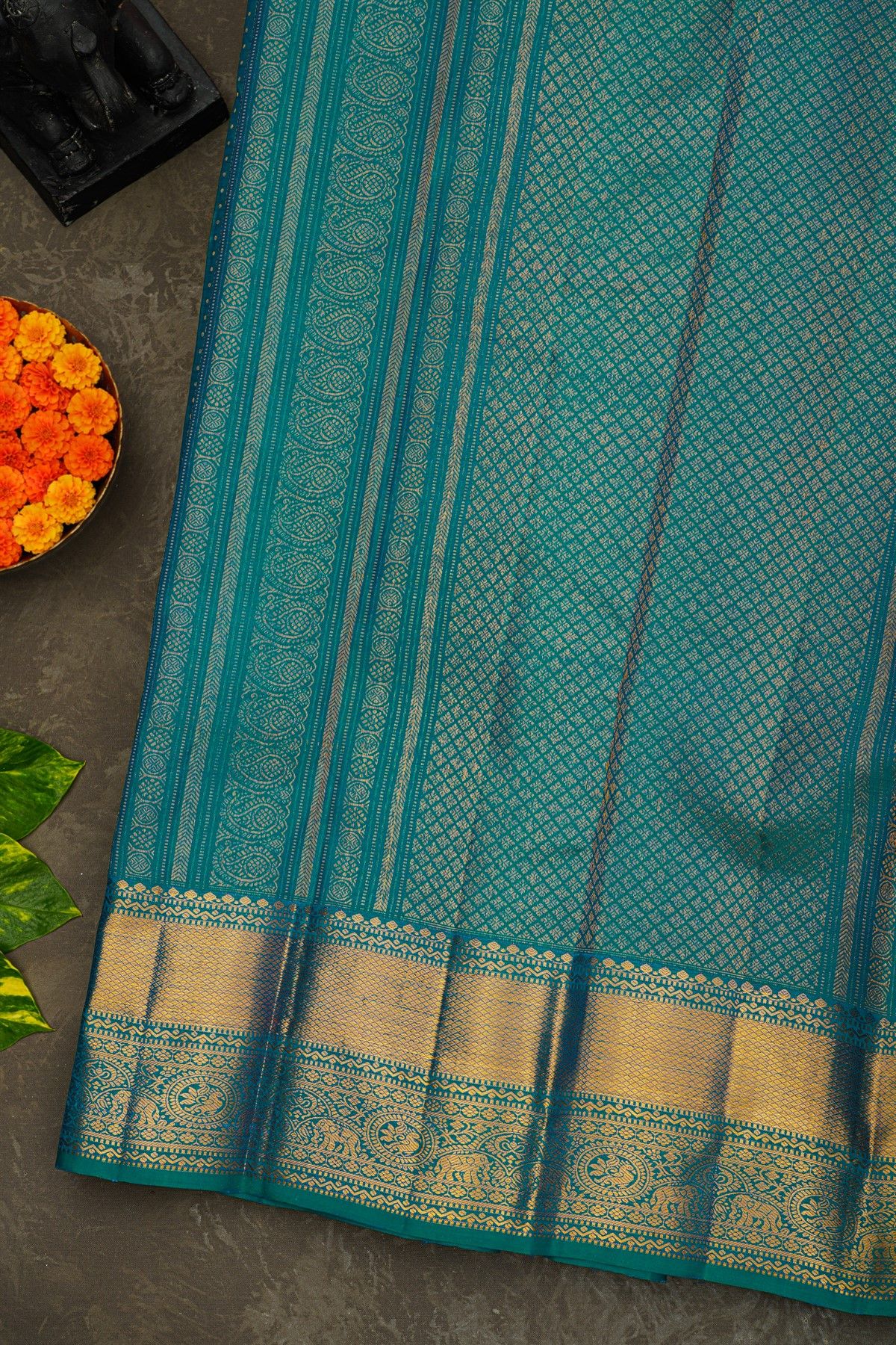 Kancheepuram Silk Teal Blue Saree With Zari Lines And Buttis Body