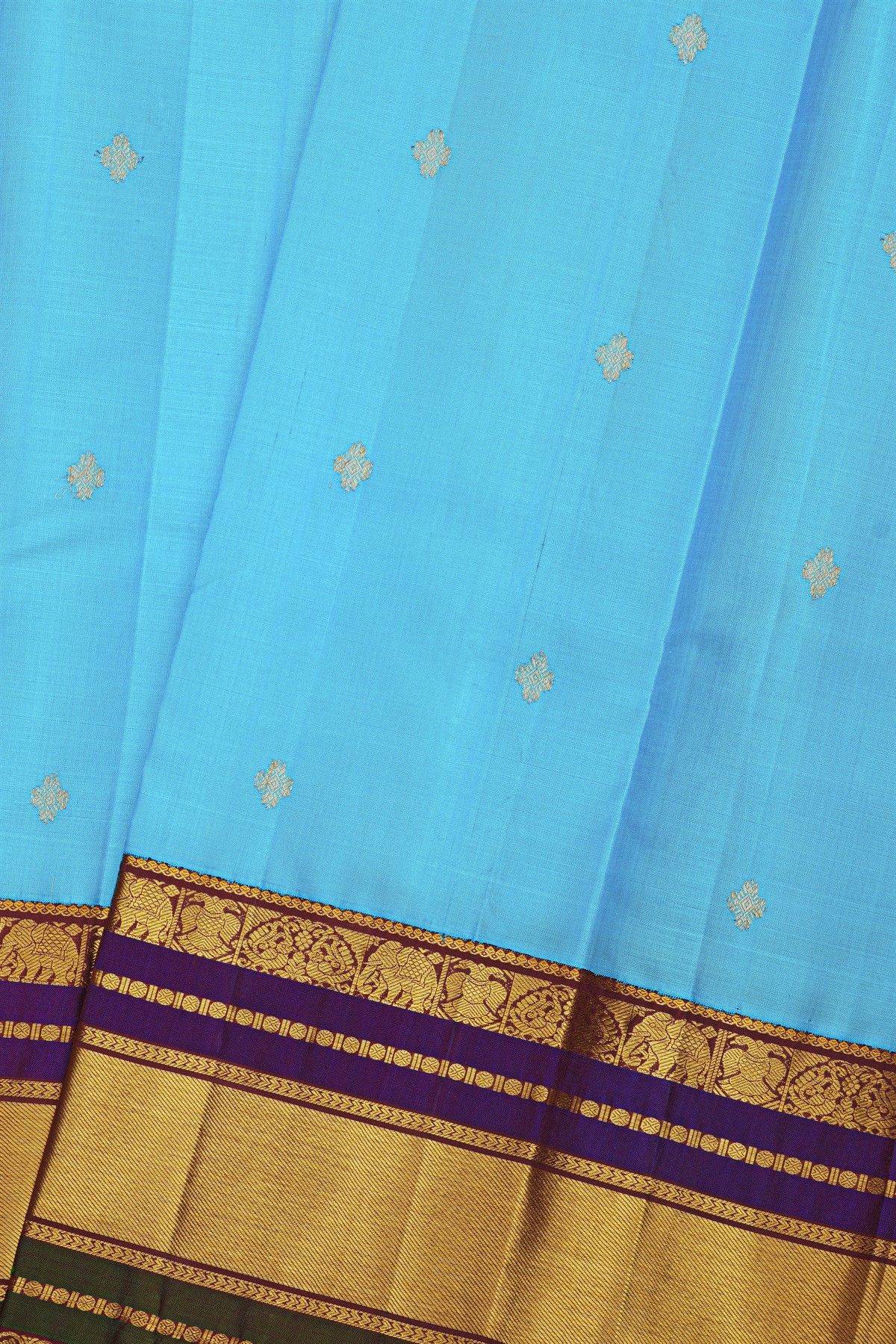 Kancheepuram Silk Sky Blue Saree With Cross Lines And Florals Kuttu Border