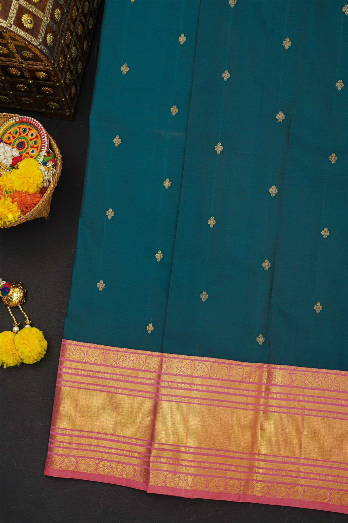 Kancheepuram Silk Teal Blue Saree With Cross Lines And Florals Border